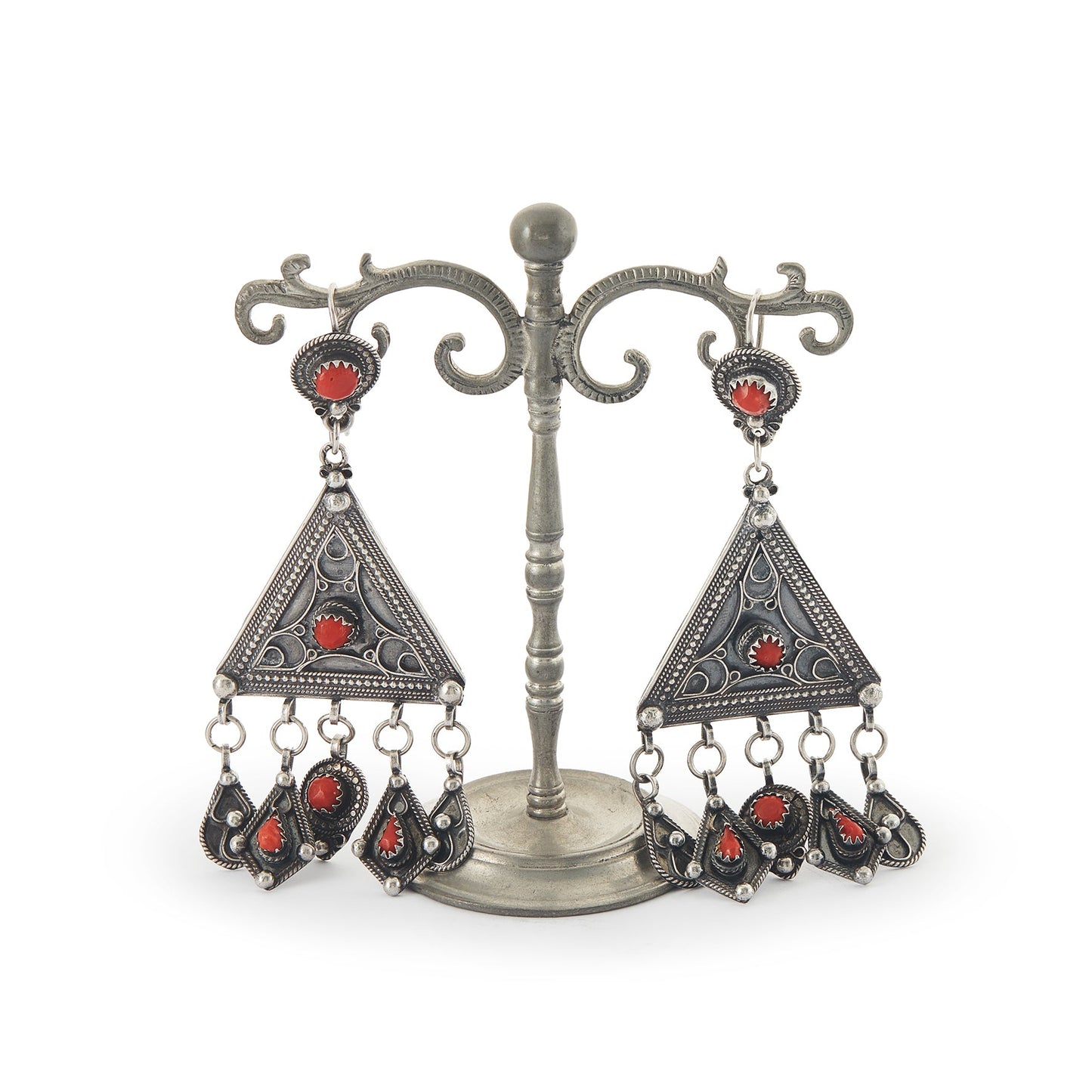 Magnificent ethnic oxidised silver chandelier earrings set with deep red coral cabochons. These large statement earrings are beautifully embossed.