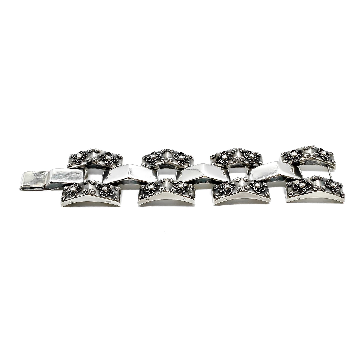 Chunky repoussé silver Mexican bracelet with beautiful ornate filigree detail. Circa 1940’s