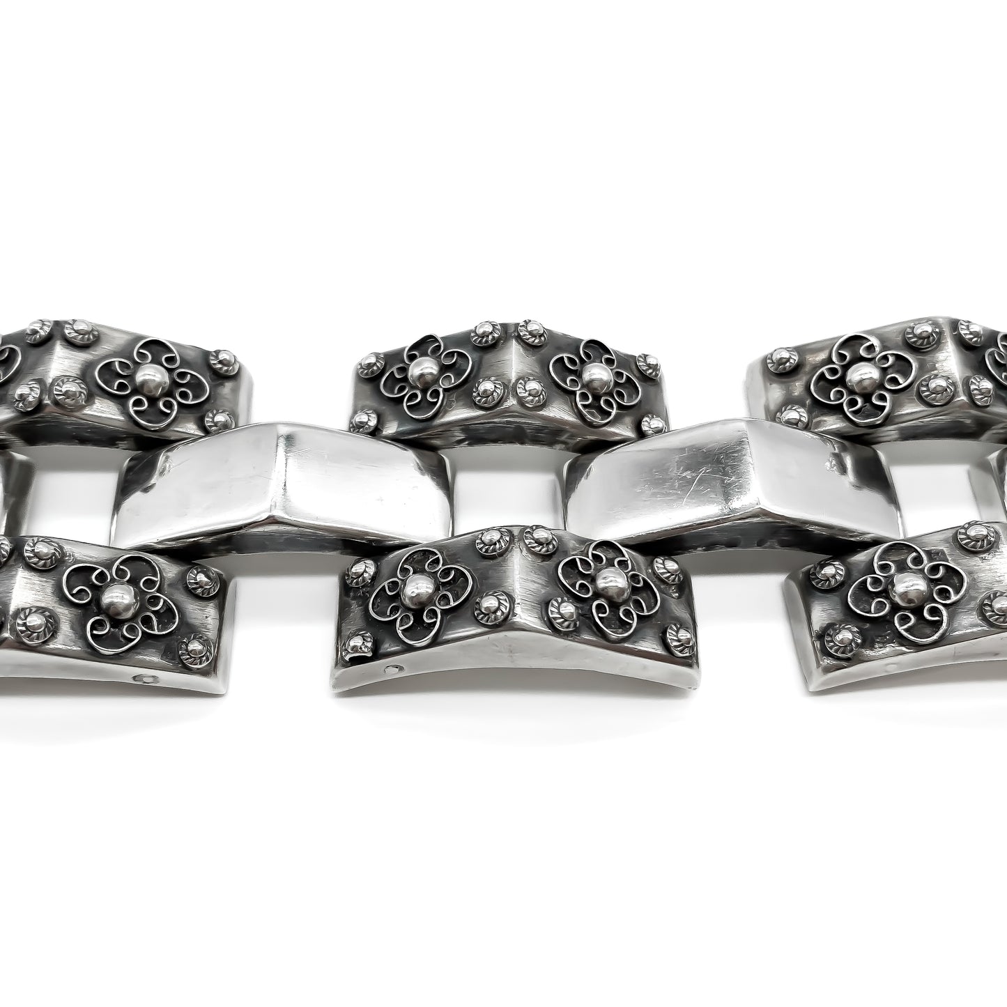 Chunky repoussé silver Mexican bracelet with beautiful ornate filigree detail. Circa 1940’s 
