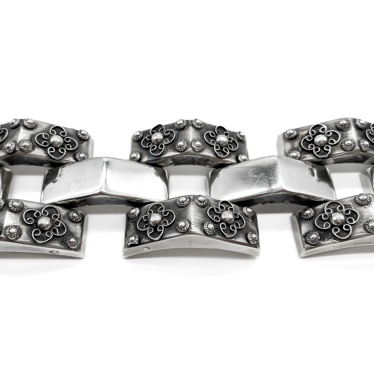 Chunky repoussé silver Mexican bracelet with beautiful ornate filigree detail. Circa 1940’s