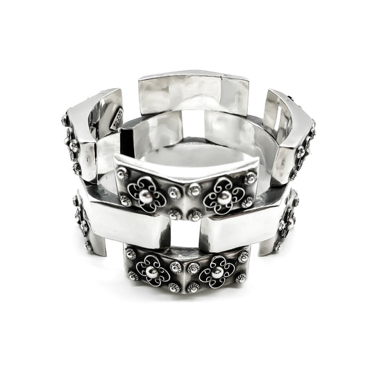 Chunky repoussé silver Mexican bracelet with beautiful ornate filigree detail. Circa 1940’s 