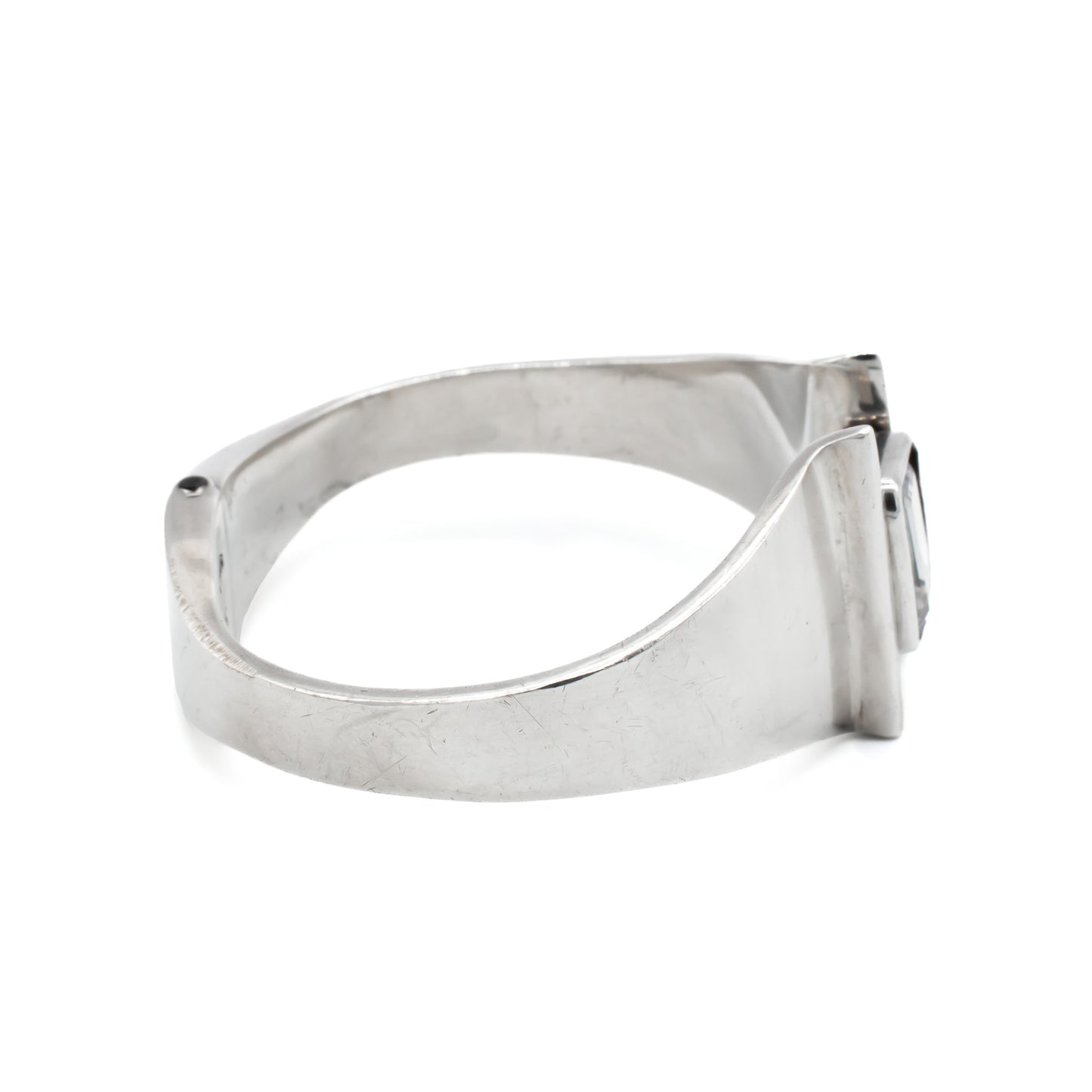 Stunning sterling silver Mexican modernist clamper bangle set with a rectangular rock crystal. Signed Mino’s. Post 1979