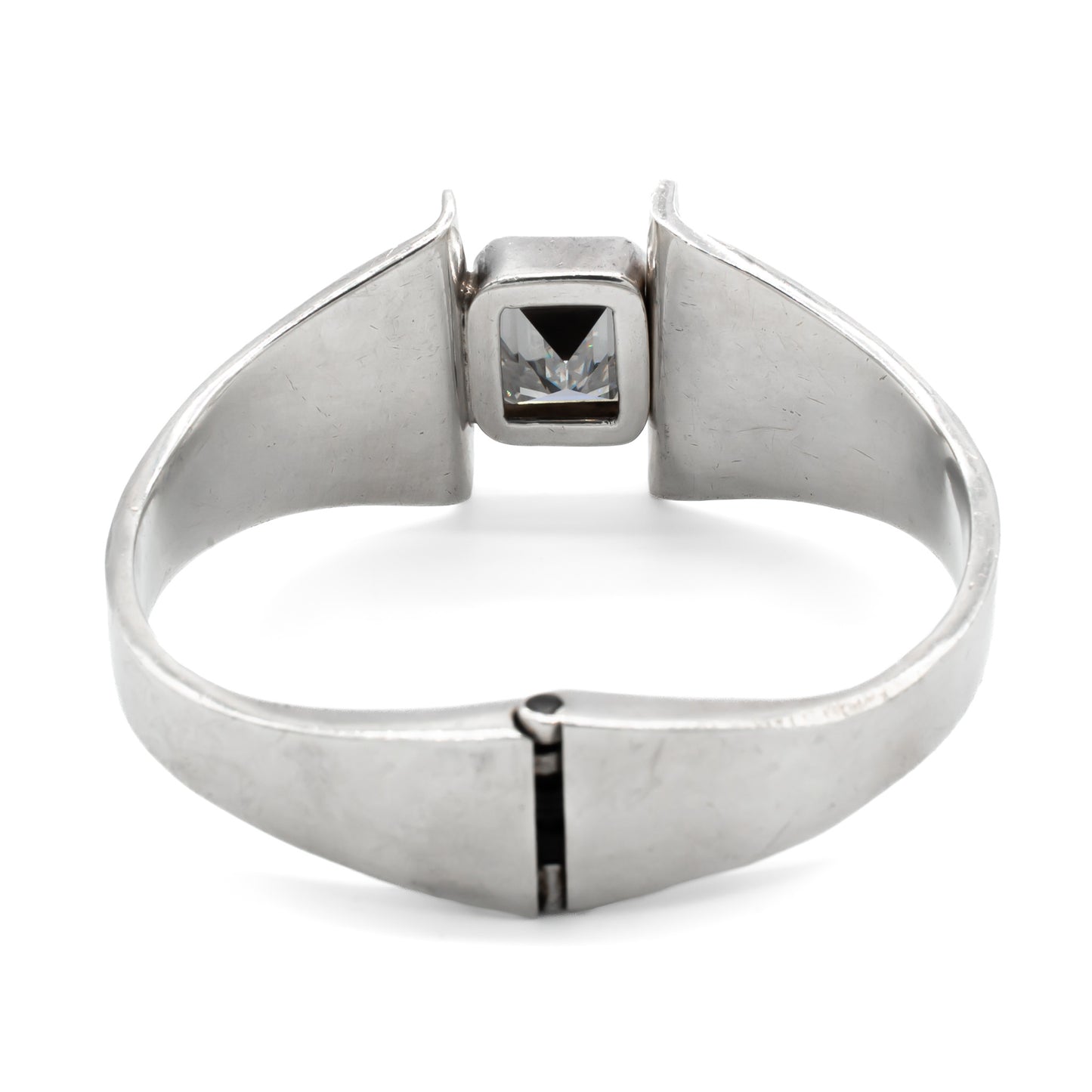 Stunning sterling silver Mexican modernist clamper bangle set with a rectangular rock crystal. Signed Mino’s. Post 1979