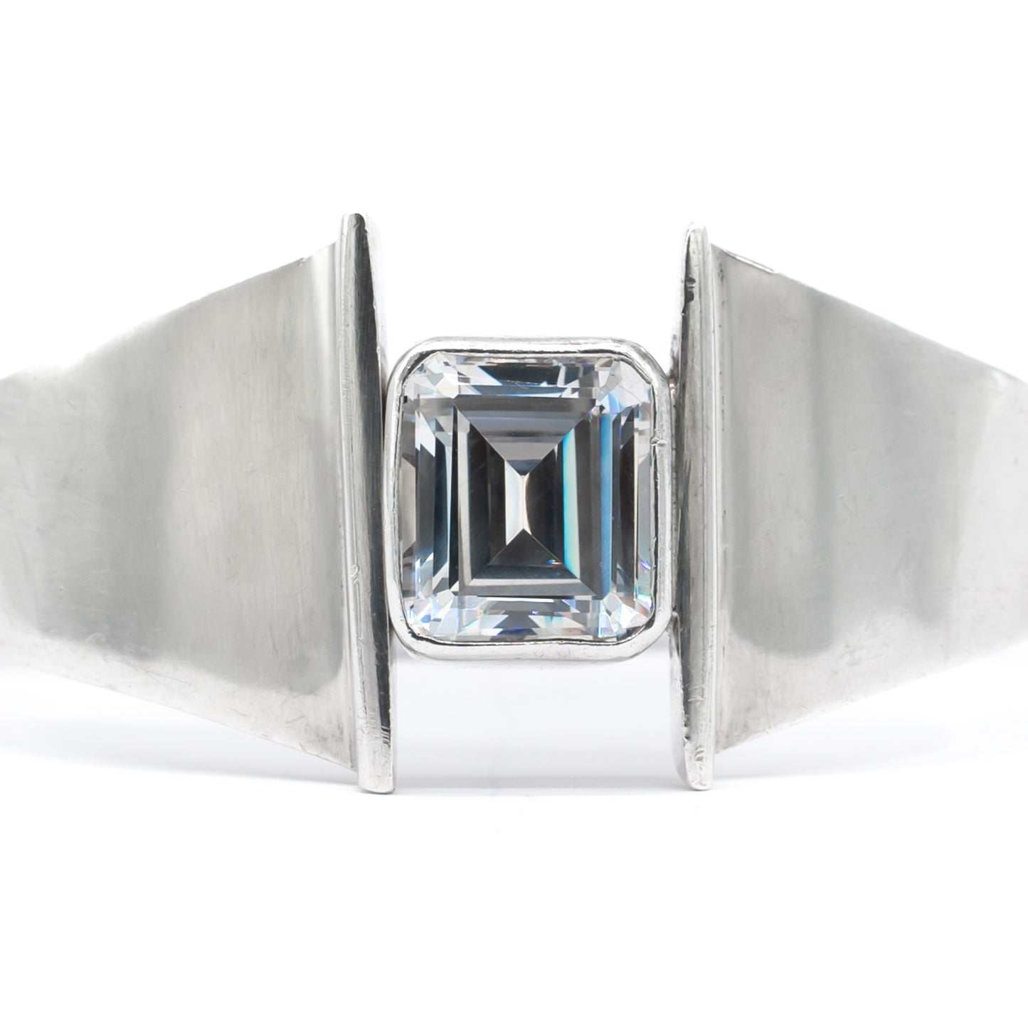 Stunning sterling silver Mexican modernist clamper bangle set with a rectangular rock crystal. Signed Mino’s. Post 1979
