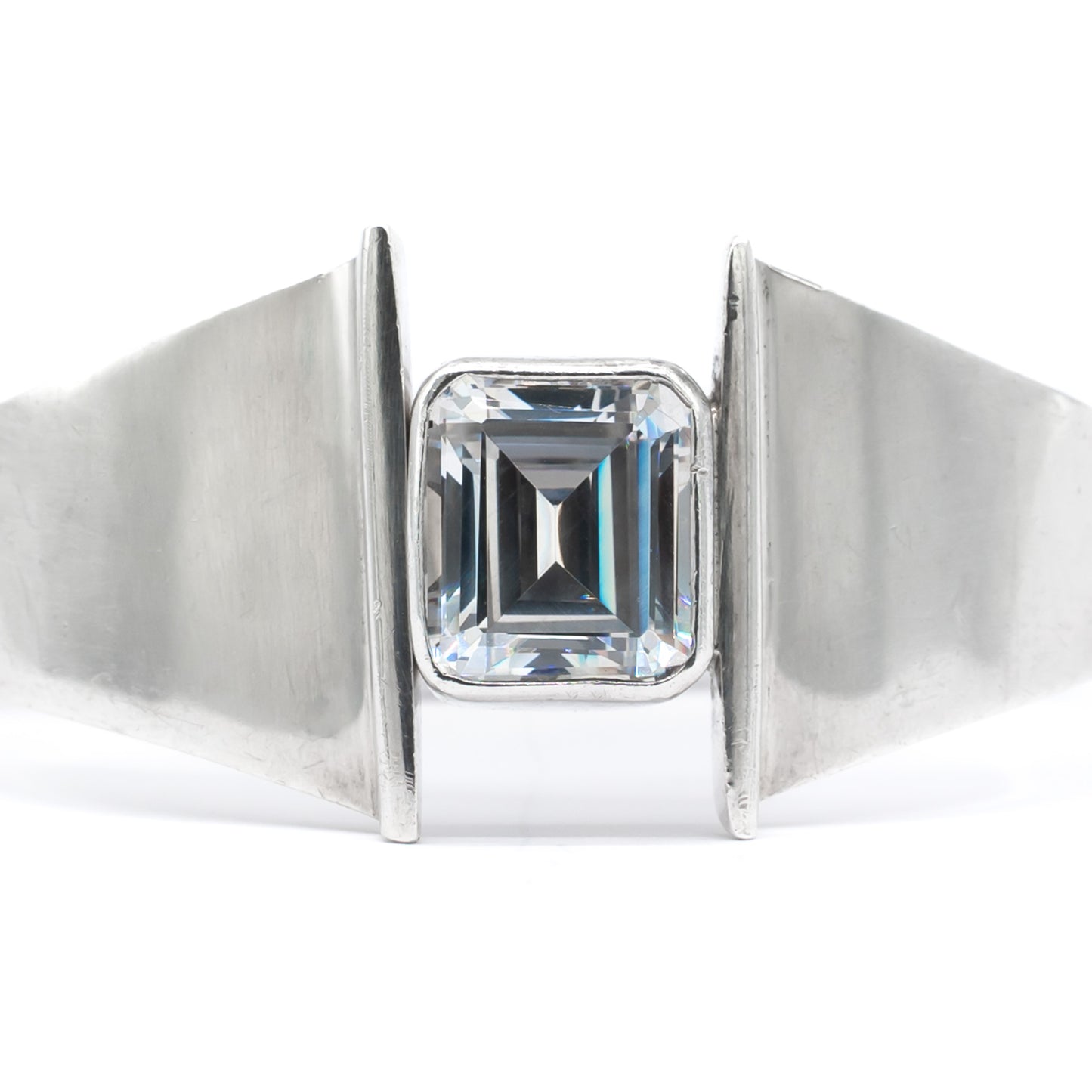 Stunning sterling silver Mexican modernist clamper bangle set with a rectangular rock crystal. Signed Mino’s. Post 1979 