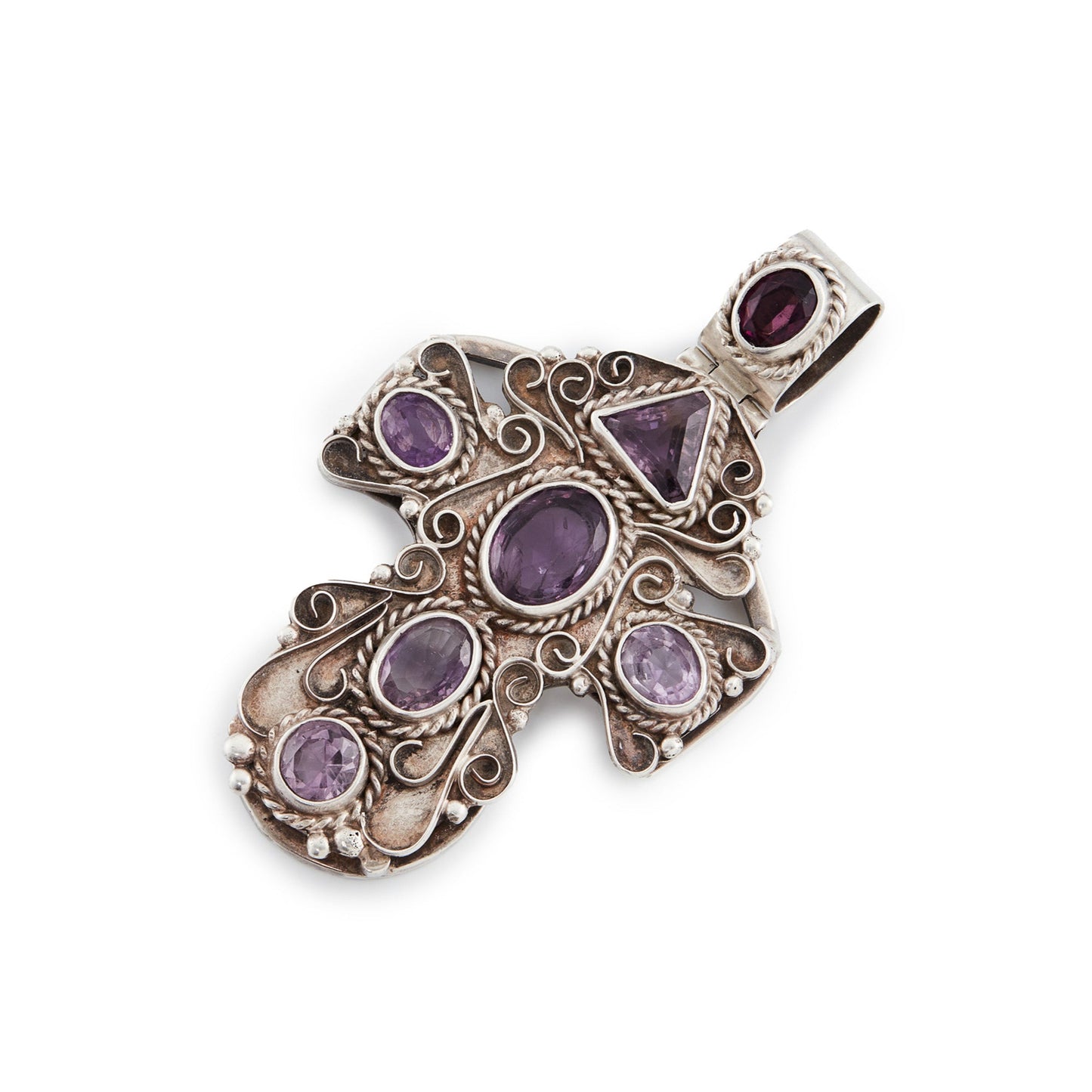 Magnificent large sterling silver Mexican cross pendant set with seven faceted amethyst stones. Circa 1940’s