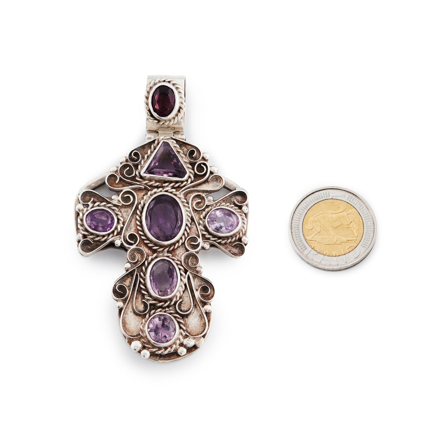 Magnificent large sterling silver Mexican cross pendant set with seven faceted amethyst stones. Circa 1940’s