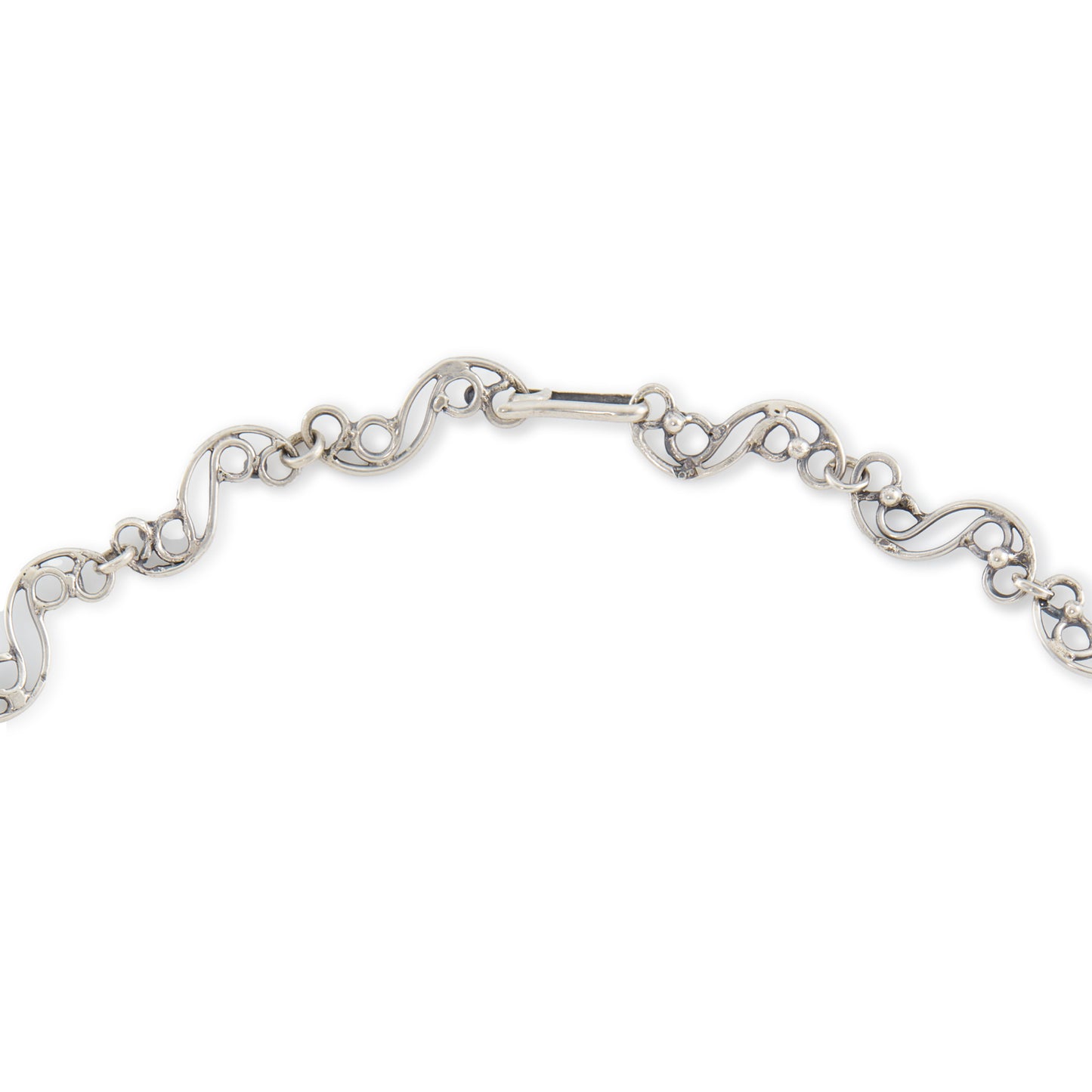 Beautiful mid-century silver festoon necklace with some oxidation and ornate detail. Set with three oval green chalcedony cabochon stones. Made in Poland. Company - Orno