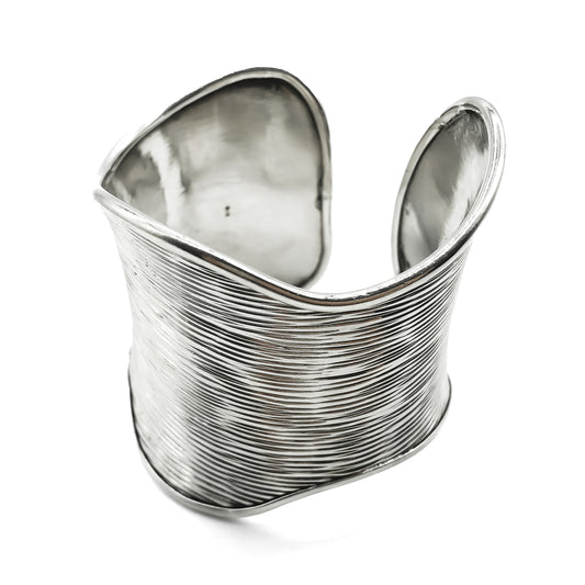 Magnificent Modernist sterling silver bangle with a textured finish.