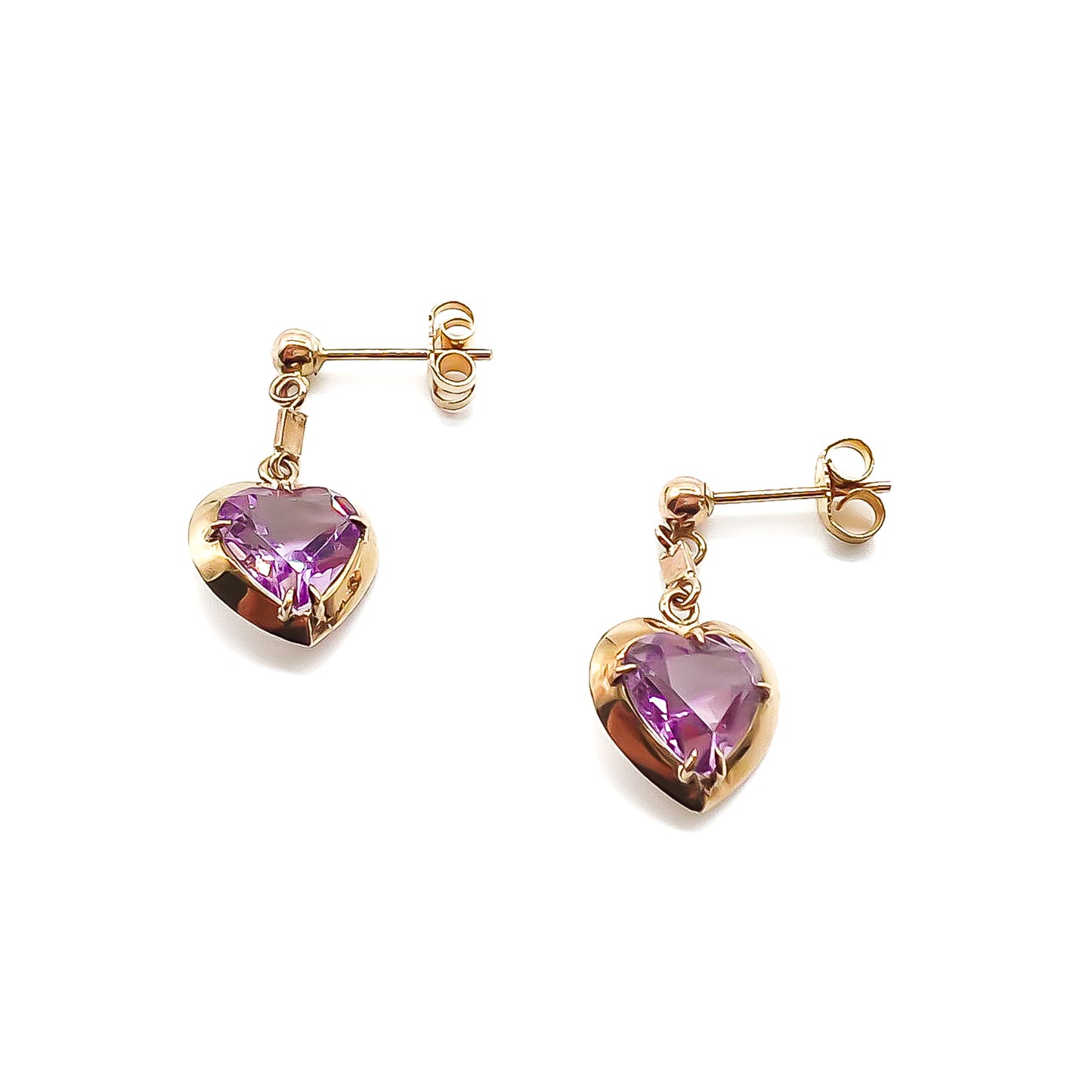 Pretty 9ct rose gold earrings set with heart-shaped faceted amethyst drops.