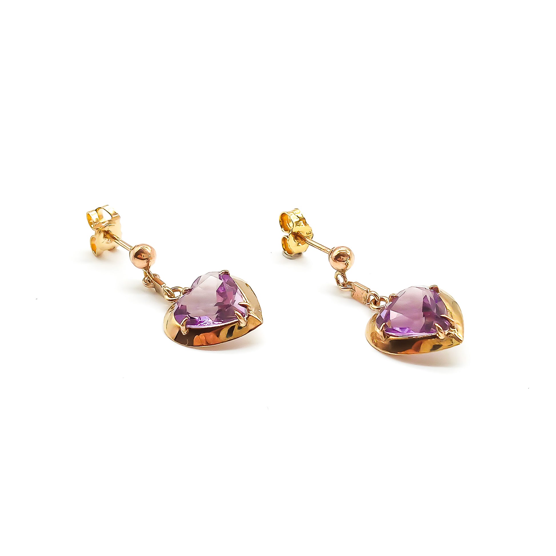 Pretty 9ct rose gold earrings set with heart-shaped faceted amethyst drops.