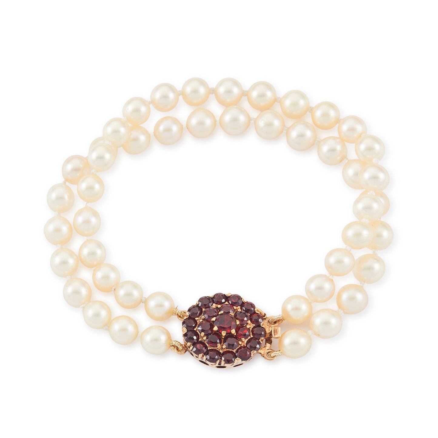 Exquisite double-strand seawater pearl bracelet with a stunning 9ct gold clasp set with twenty-two deep red garnets.