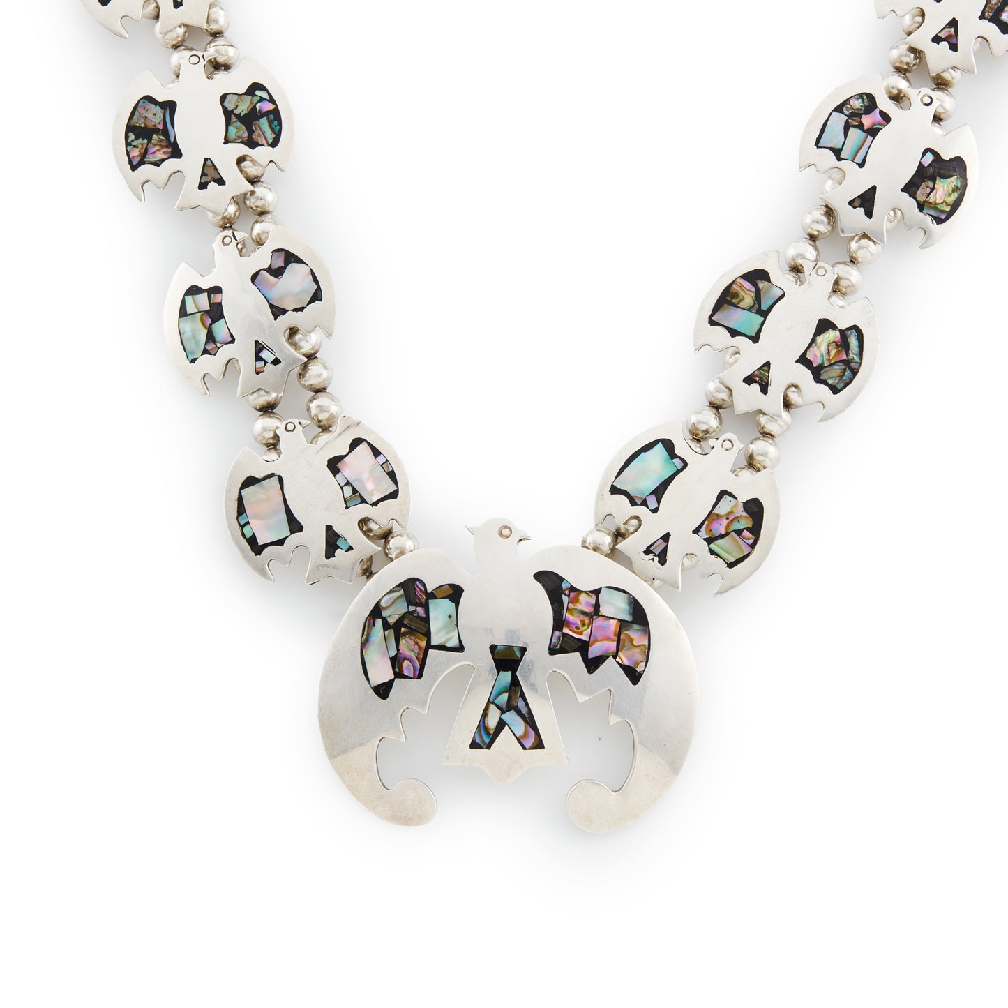 Stunning sterling silver Native American squash blossom necklace with abalone inlay in a beautiful eagle design. A real statement piece.