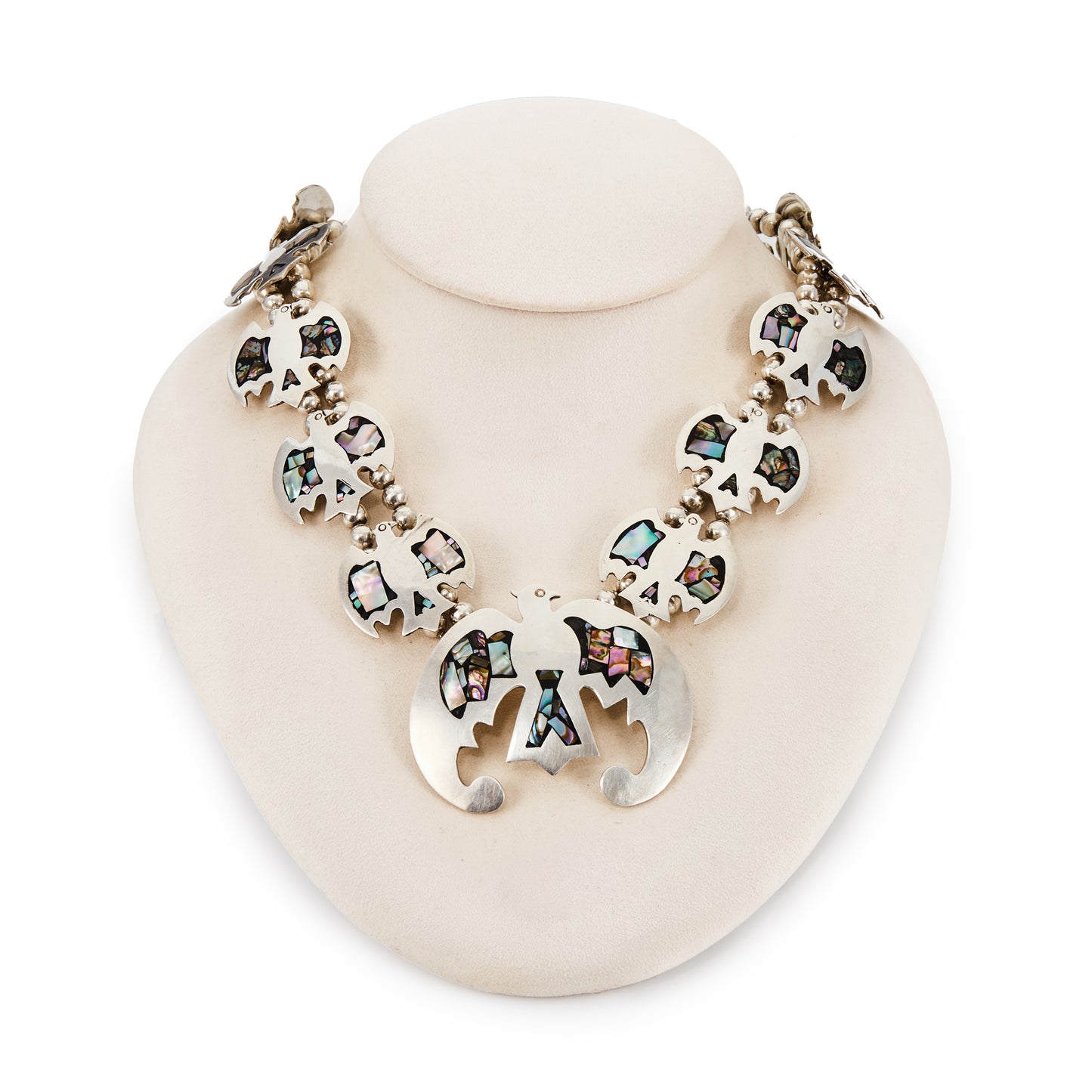 Stunning sterling silver Native American squash blossom necklace with abalone inlay in a beautiful eagle design. A real statement piece.
