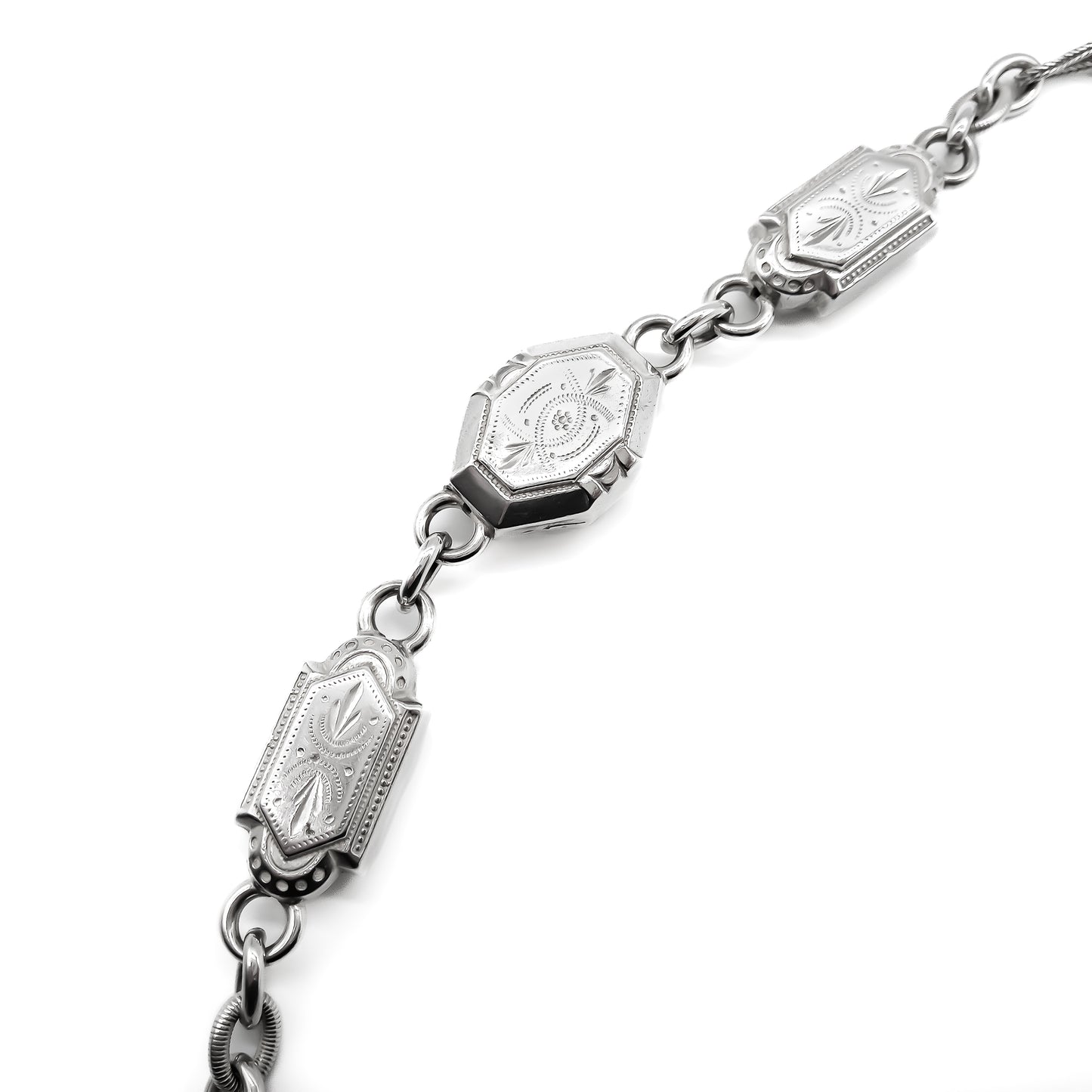Magnificent silver Albertina necklace with ornate detail and dog-clip clasp. Italy. Circa 1900’s 