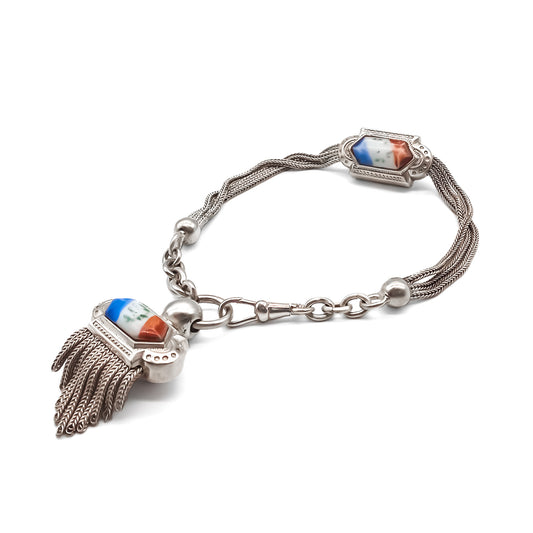 Unique French silver Albertina with a beautiful tassel and colourful porcelain inlay. Circa 1900