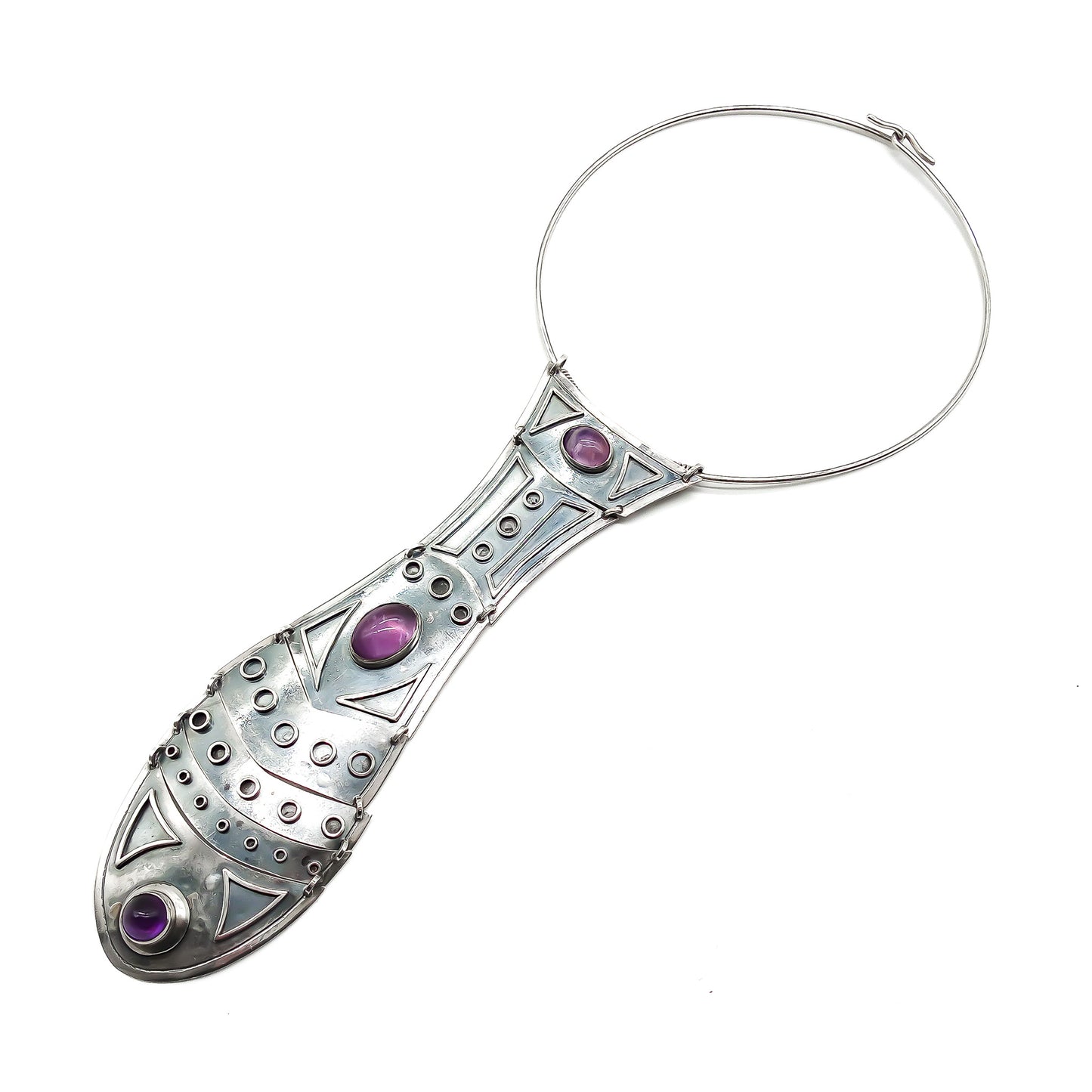 Handmade oxidised silver choker with stunning oversized fish pendant set with three cabochon amethysts. Designer: Tessa Fleischer (South Africa)
Circa 1970’s
