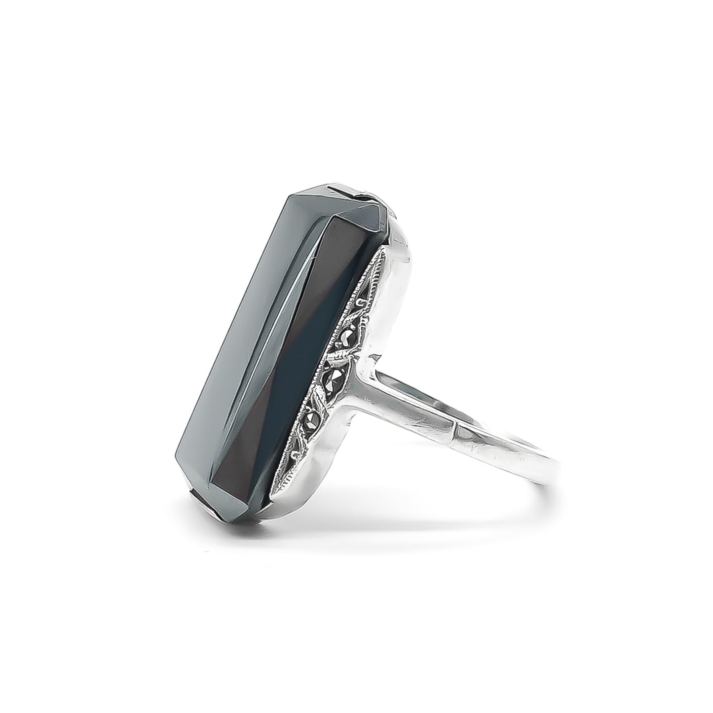 Lovely Art Deco sterling silver ring set with a faceted rectangular hematite and marcasite stones.