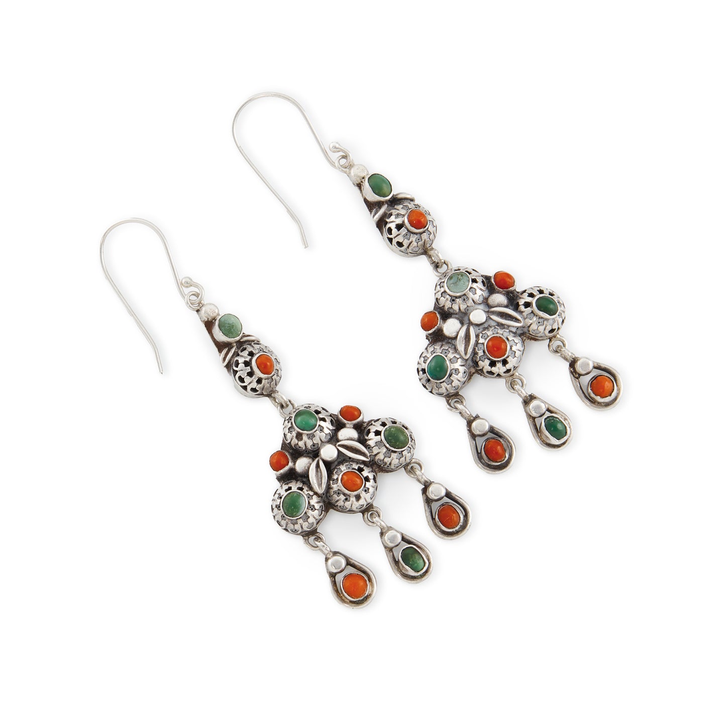 Elaborate silver dangling earrings, each set with six natural round coral beads and five green turquoise stones. Beautiful engraving on the backs of the earrings. Italy. Circa 1930’s