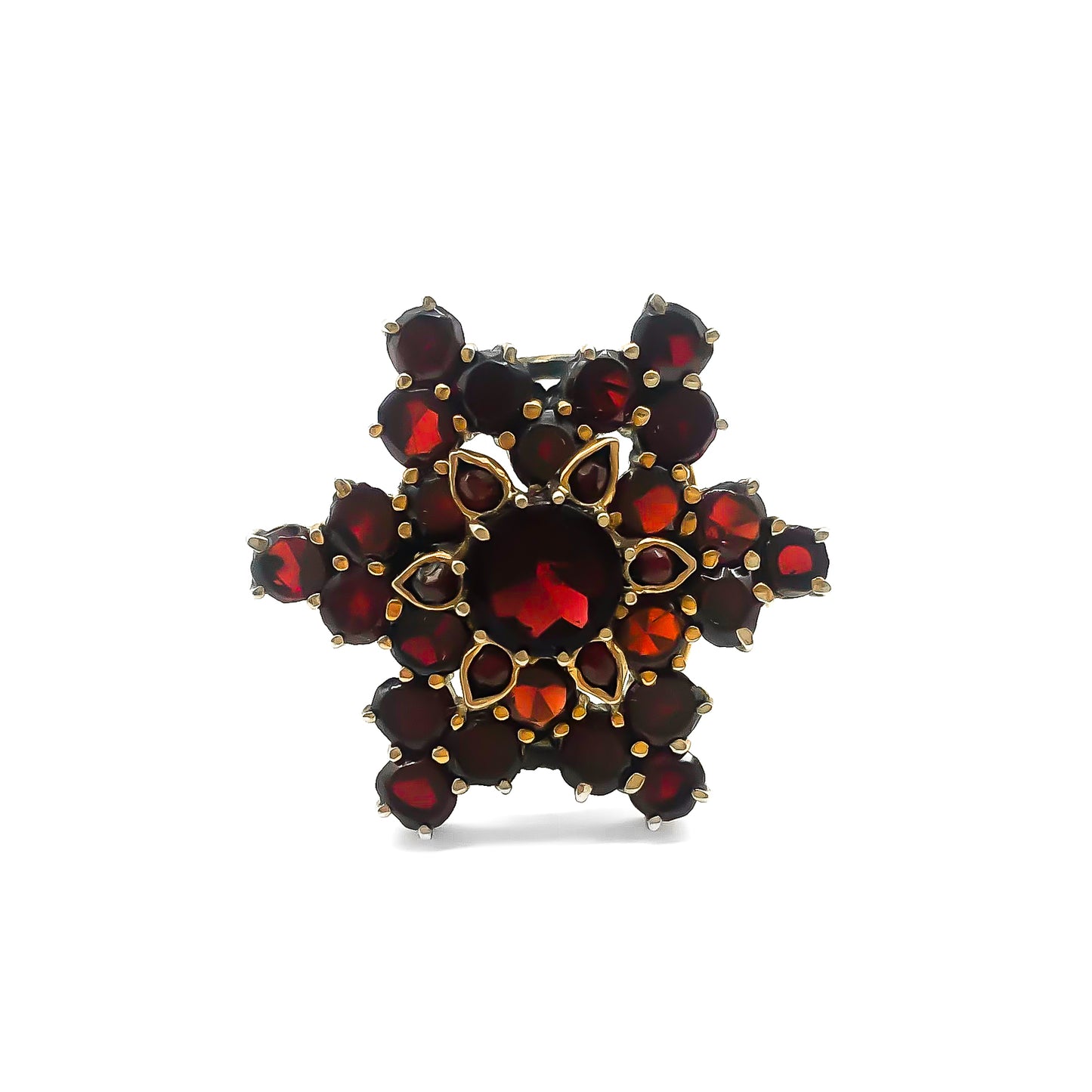 Vintage silver gilt ring set with bohemian garnets in a star design.