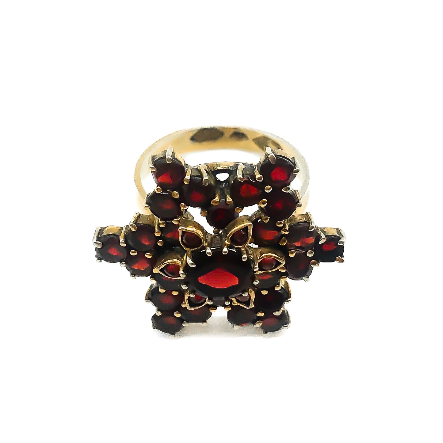 Vintage silver gilt ring set with bohemian garnets in a star design.