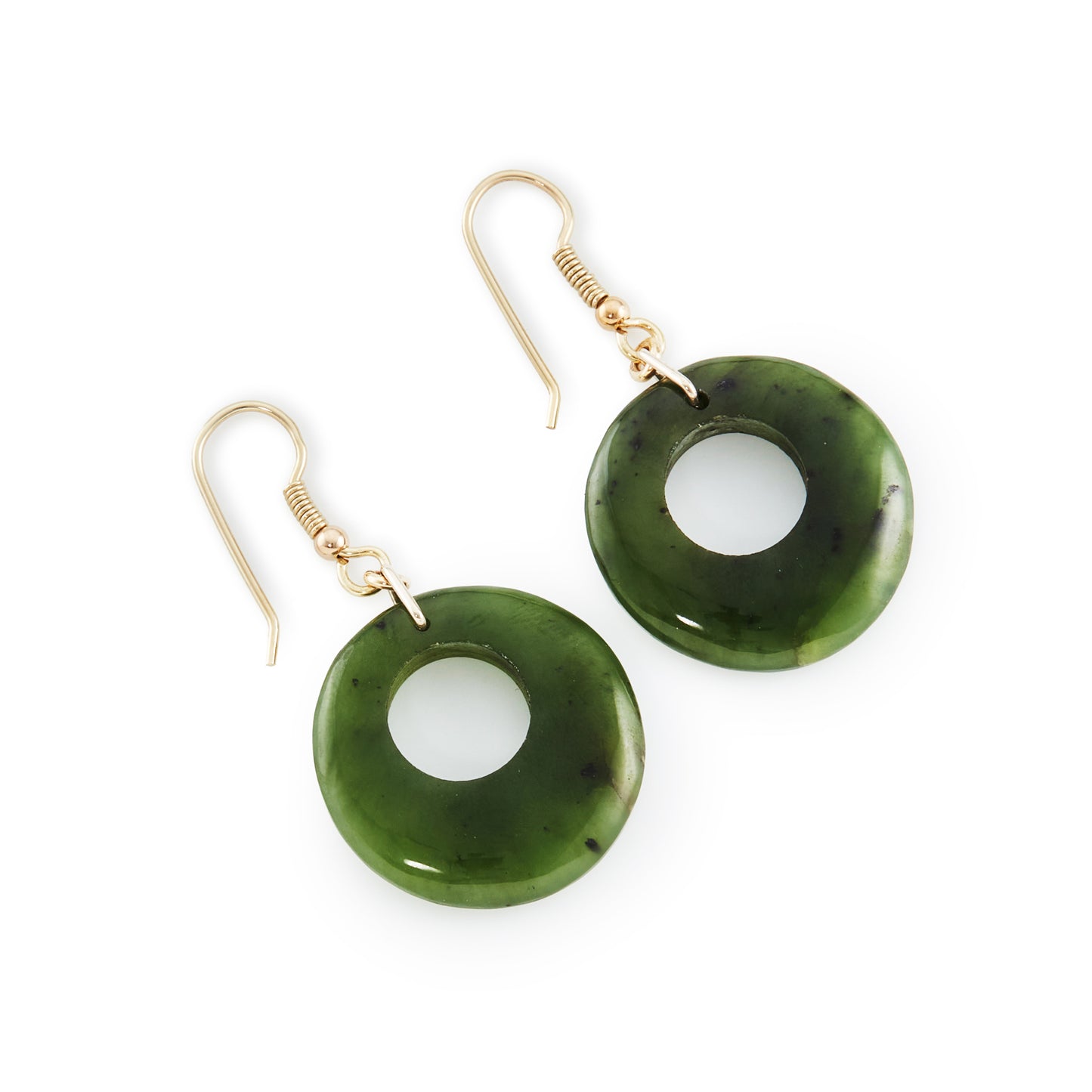 Classic vintage deep green nephrite jade circular earrings with silver gilt shepherd hooks.