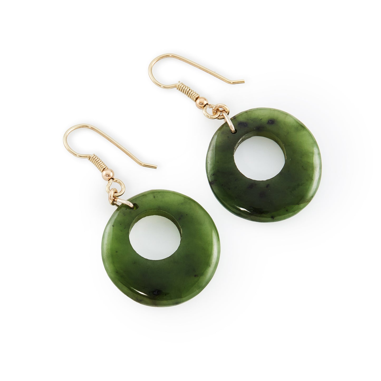 Classic vintage deep green nephrite jade circular earrings with silver gilt shepherd hooks.