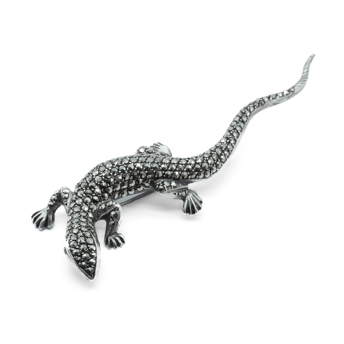 Stunning life-size lizard brooch set with lots of sparkling marcasites and green glass eyes. Circa 1930’s