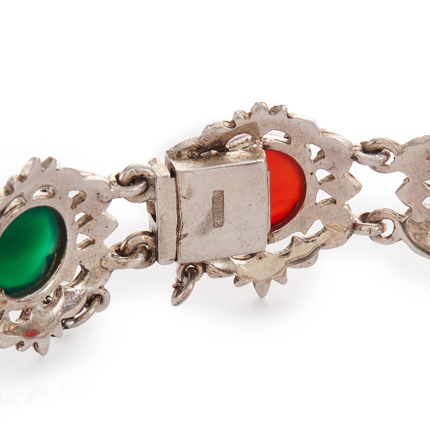 Stunning silver marcasite bracelet set with a combination of round cabochon gemstones: carnelian, rose quartz, tigers eye, moss agate, and chrysoprase in an intricate setting. Safety chain attached.