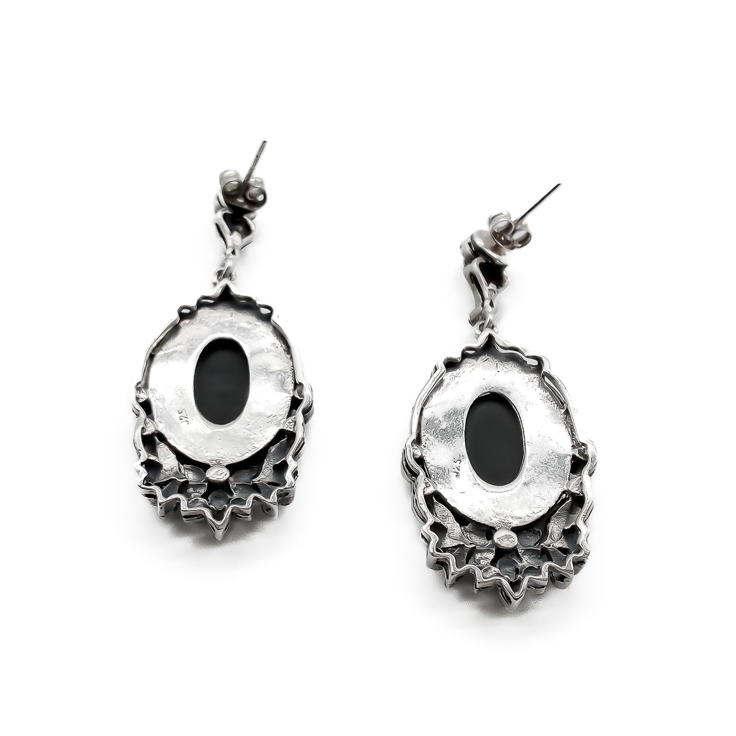 Stunning vintage silver drop earrings, each set with an oval onyx cabochon stone and marcasites in a floral design.