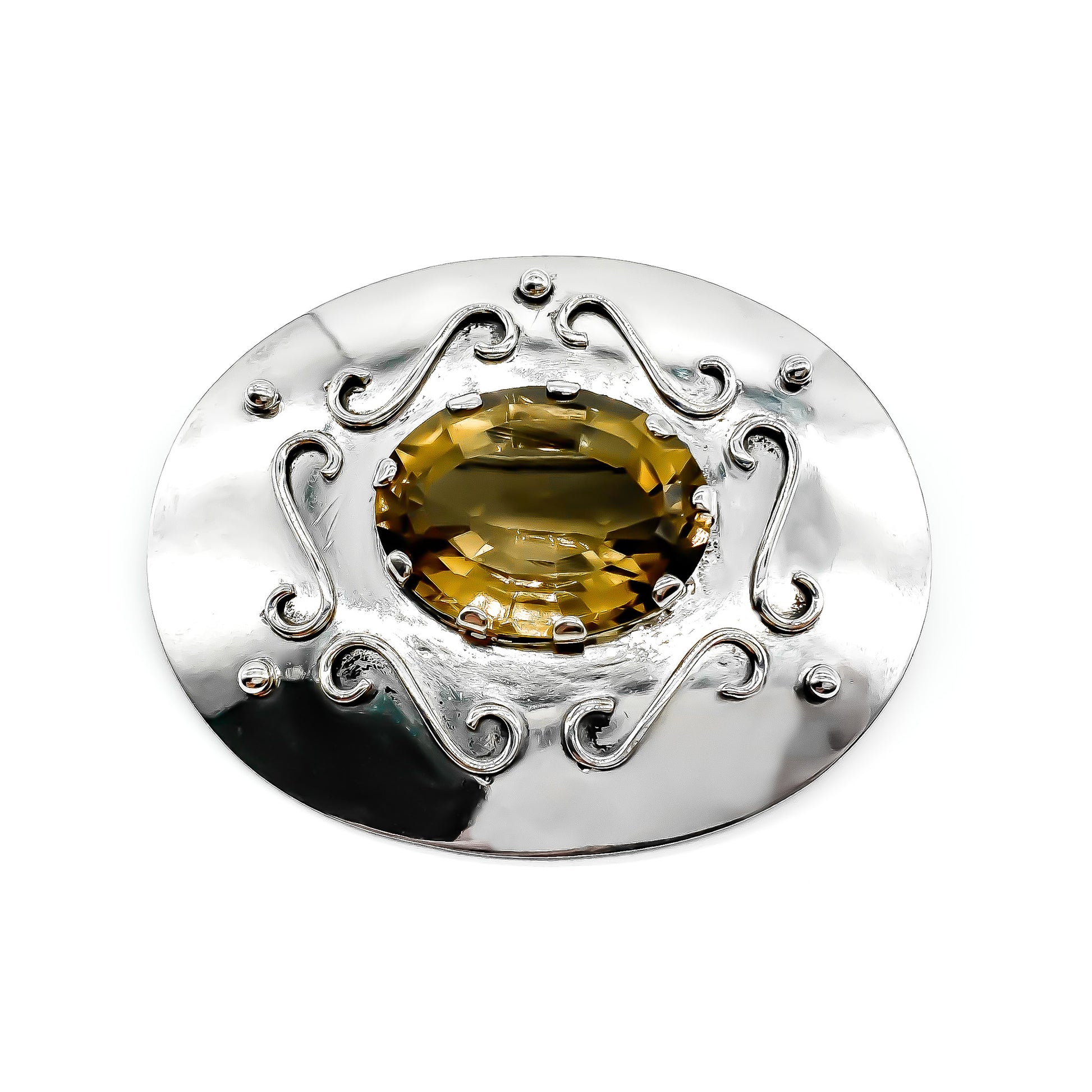 Impressive vintage silver handmade brooch set with a beautifully faceted oval smoky quartz.   Circa 1950’s
