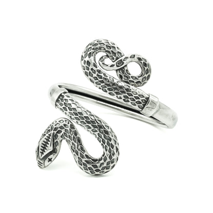Magnificent sterling silver serpent bangle that coils around the arm. Size adjustable. Italy