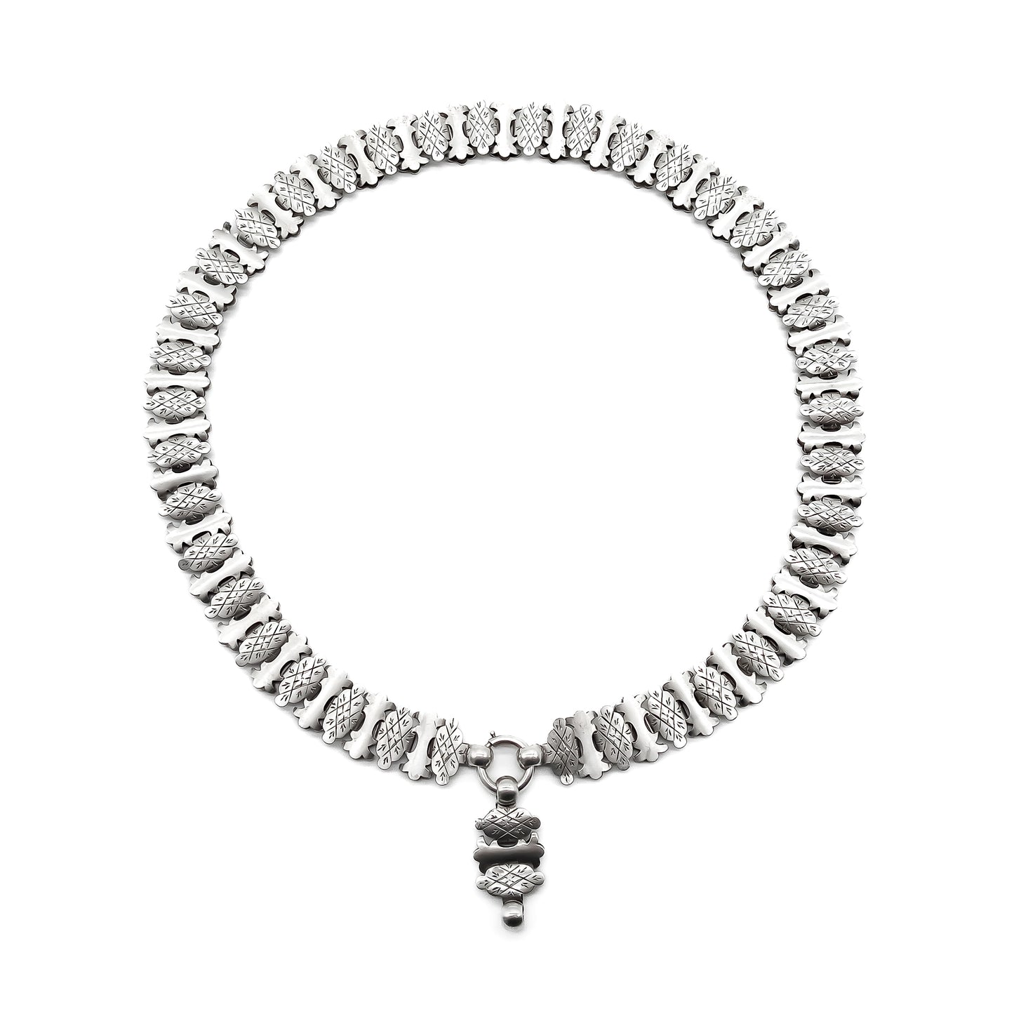 Classic Victorian silver choker with beautifully engraved links and an attachment to add a locket or medallion.