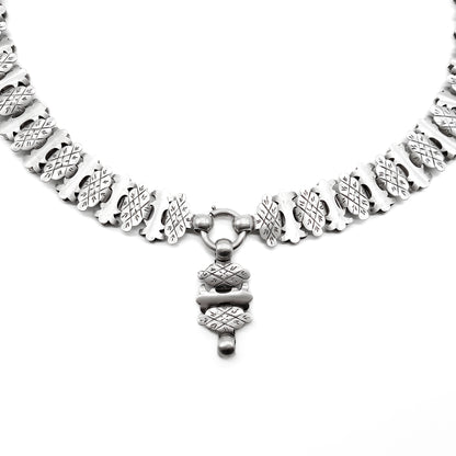 Classic Victorian silver choker with beautifully engraved links and an attachment to add a locket or medallion. 