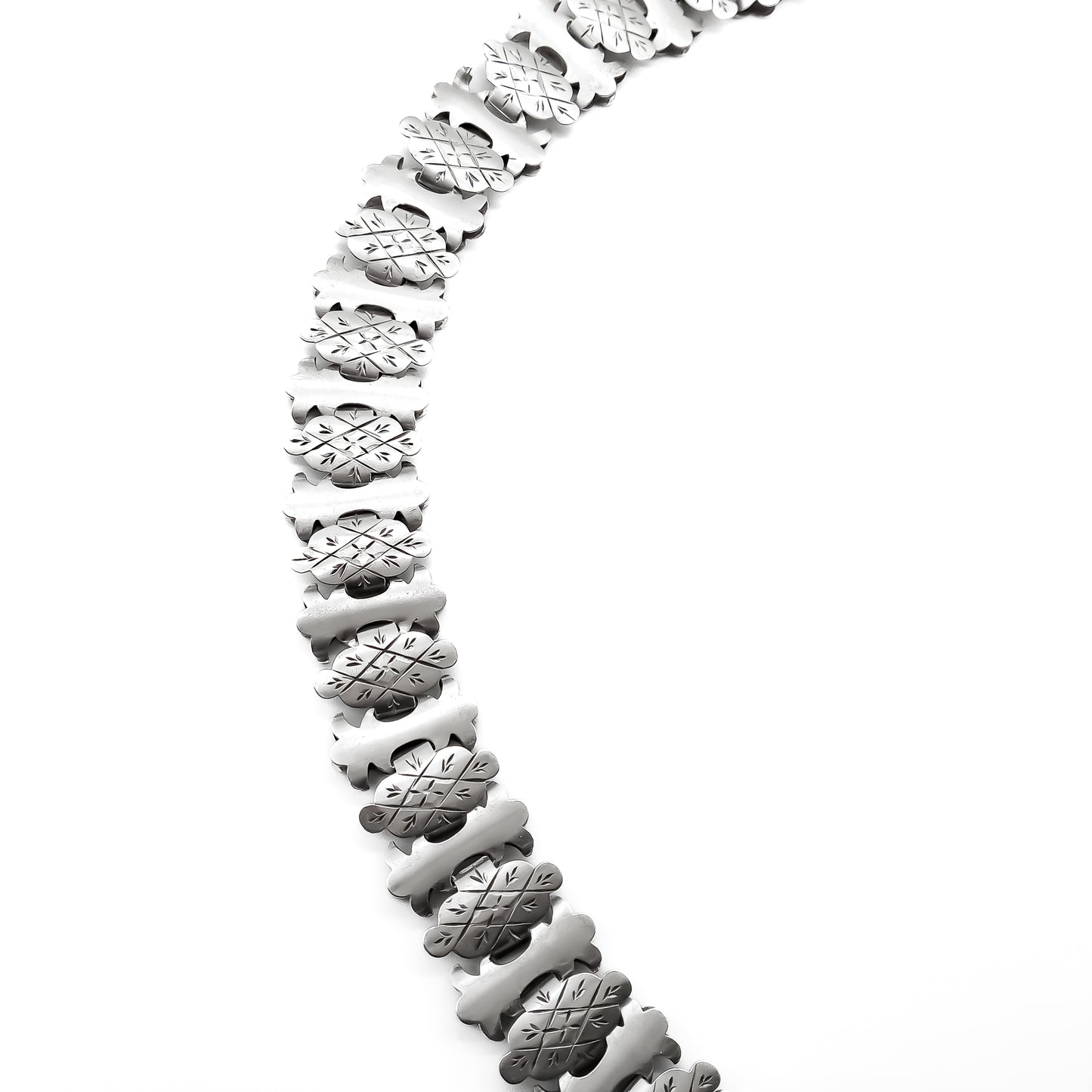 Classic Victorian silver choker with beautifully engraved links and an attachment to add a locket or medallion.