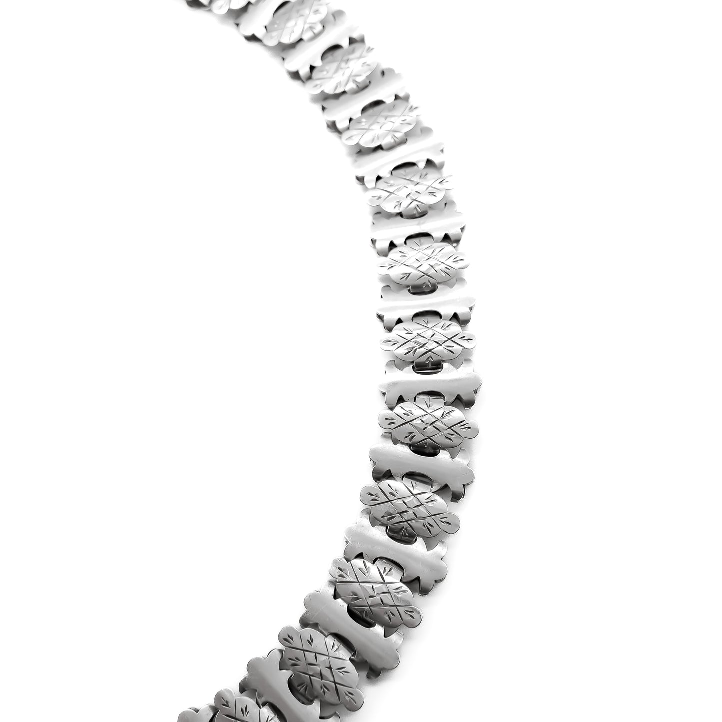 Classic Victorian silver choker with beautifully engraved links and an attachment to add a locket or medallion.