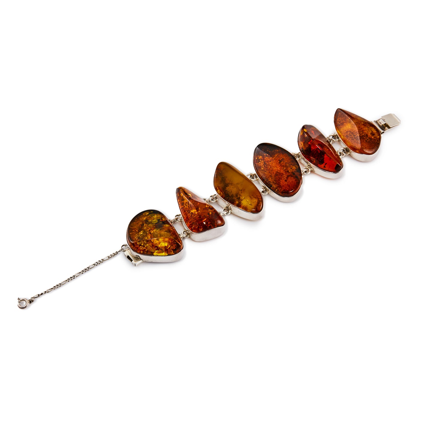 Stunning sterling silver belcher link bracelet, set with six beautiful organic shaped natural pieces of amber in a variety of different hues. Safety chain attached.