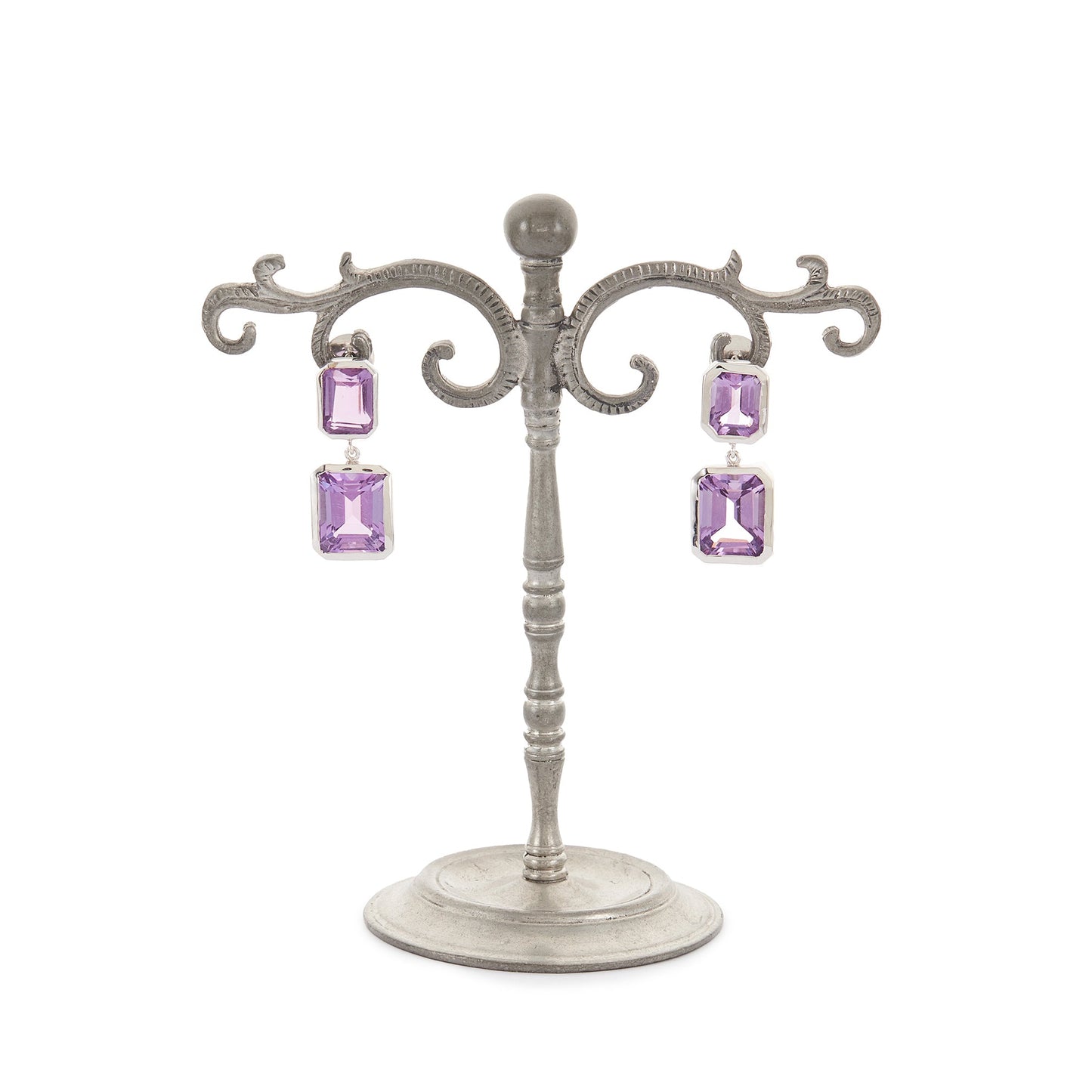 Stylish sterling silver drop earrings set with beautifully faceted amethysts.