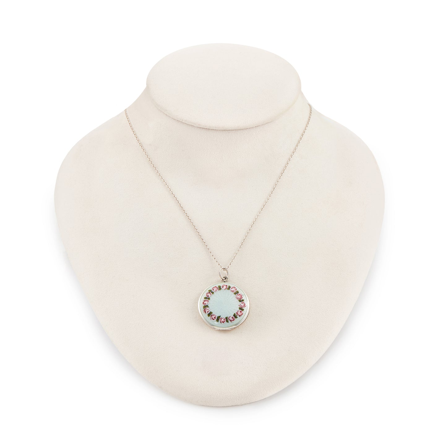 Pretty vintage sterling silver locket with an enamel floral design on a light blue background, on a sterling silver chain.