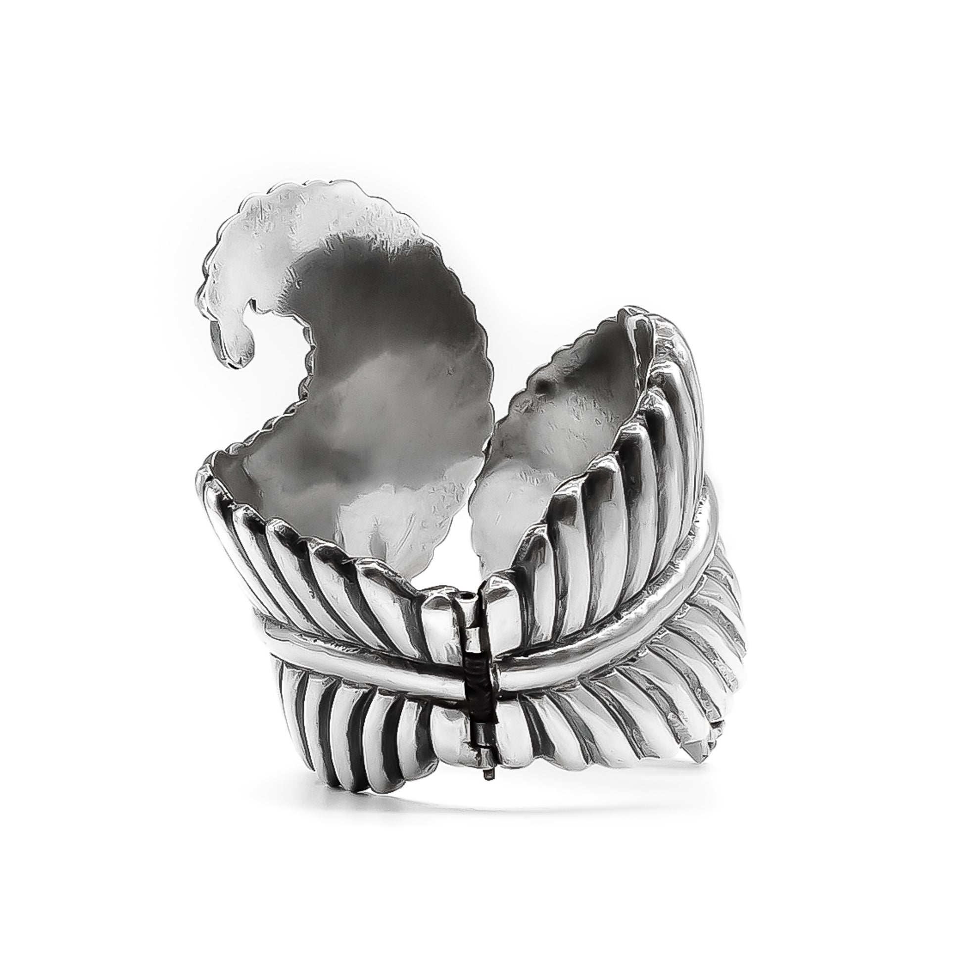 Gorgeous sterling silver Mexican repousse clamper bangle with a fern leaf design. Bangle opens to fit most wrists. Taxco. Eagle Hallmark