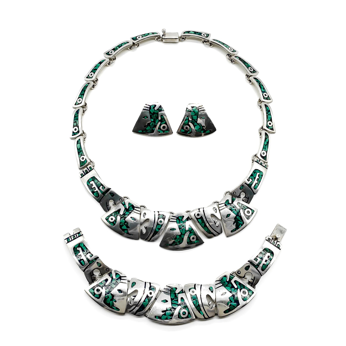 Very unusual vintage sterling silver Mexican set consisting of a necklace, bracelet and stud earrings, with a malachite inlay and geometric face design. TC-29 Post 1980