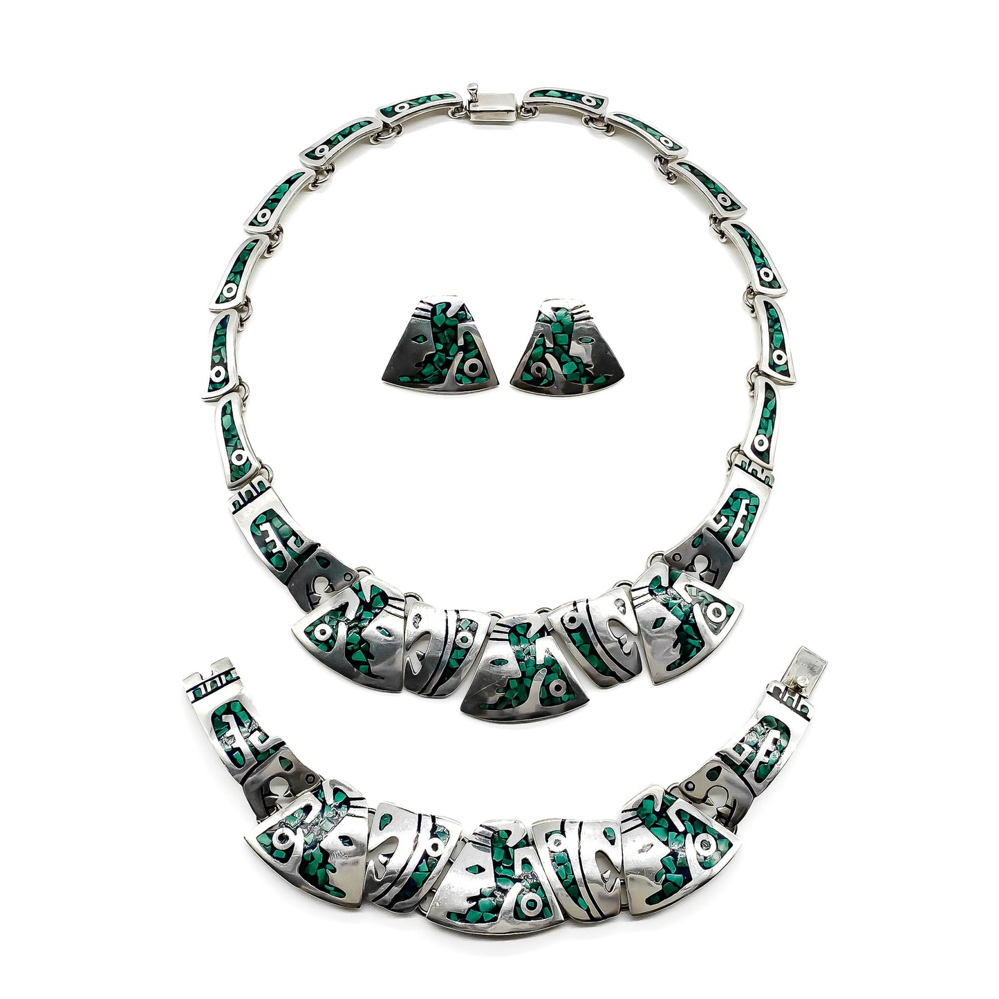 Very unusual vintage sterling silver Mexican set consisting of a necklace, bracelet and stud earrings, with a malachite inlay and geometric face design. TC-29 Post 1980