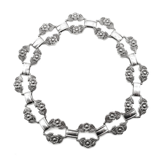 Stunning sterling silver Peruvian necklace with flower motif.