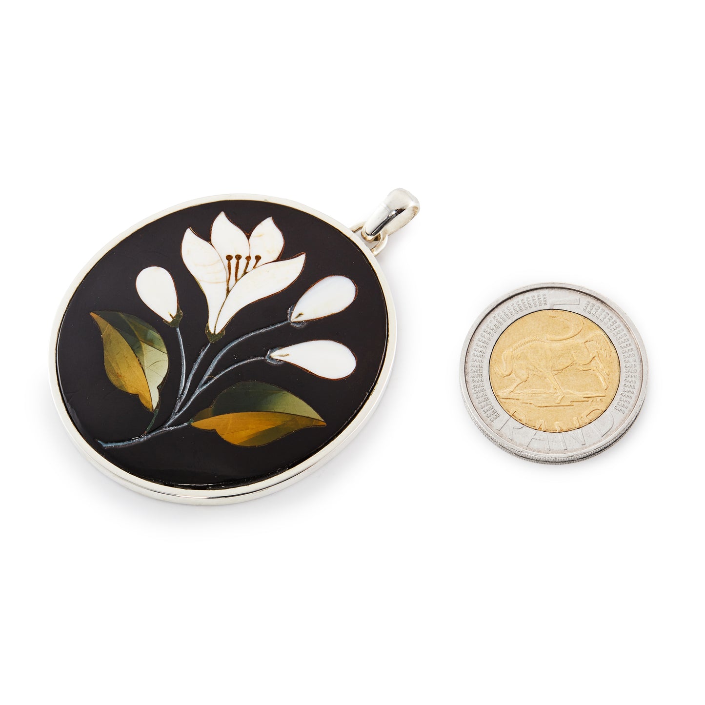 Magnificent antique Pietra Dura natural stone pendant depicting a white flower, three buds and two leaves. Set in sterling silver.