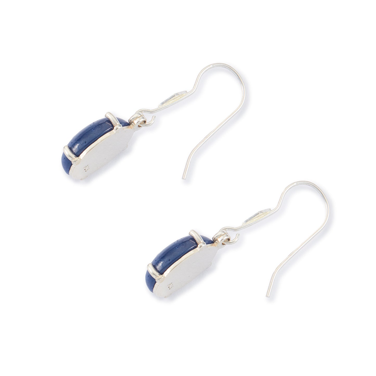 Sterling silver drop earrings, each set with a deep-blue cabochon star sapphire.