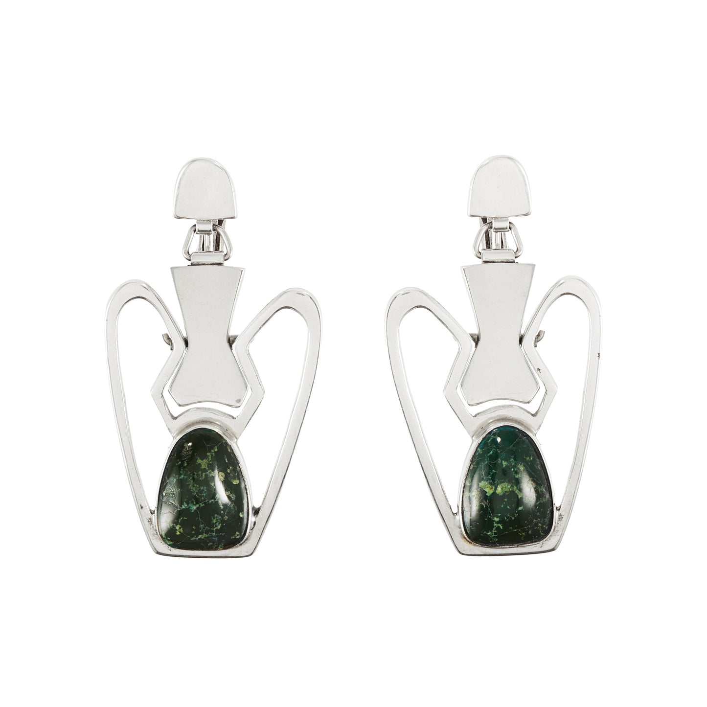 Stunning sterling silver Mexican earrings, set with natural green gemstones. Screw back fasteners. Eagle Mark (pre 1979).
Designer: Erika Hult de Corral.