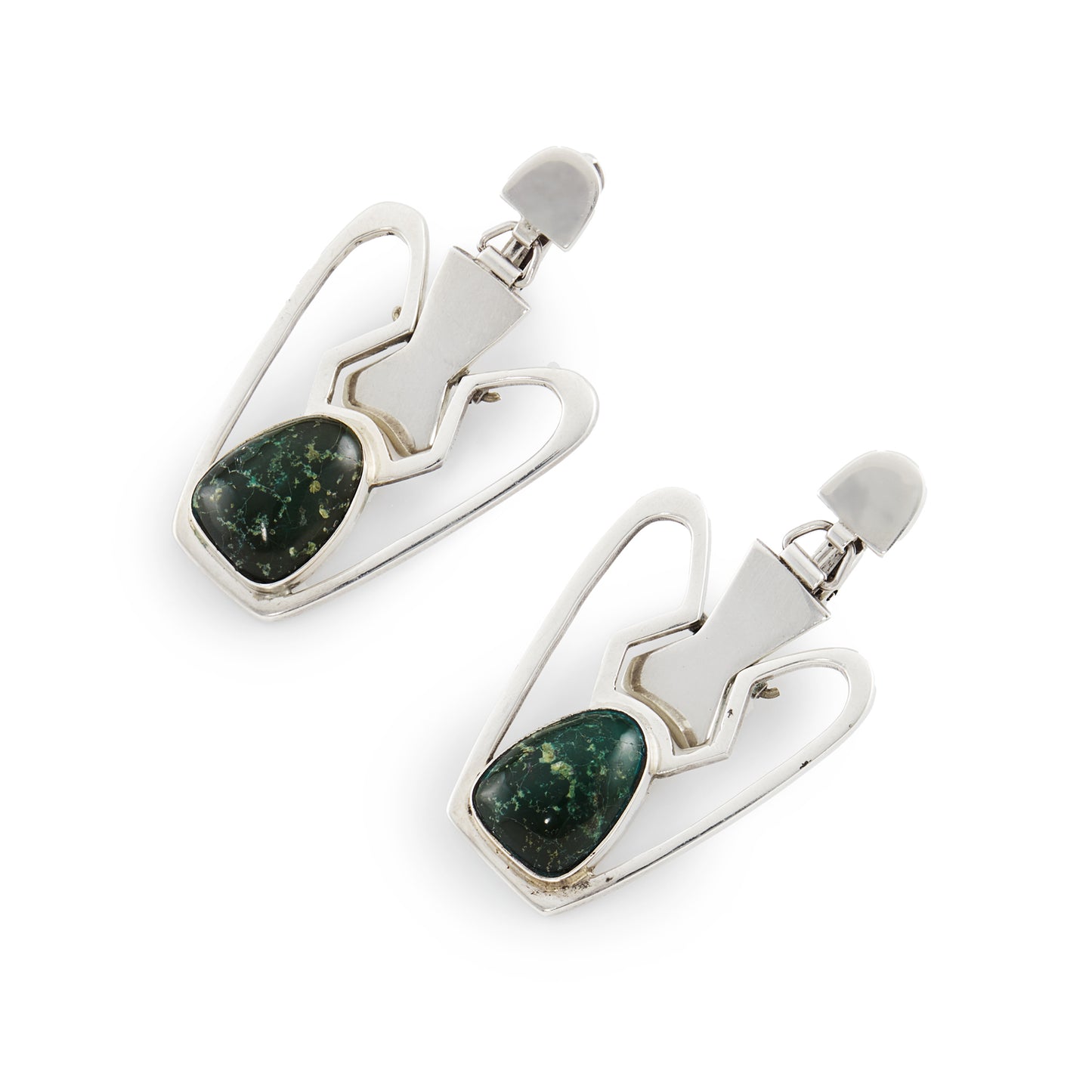 Stunning sterling silver Mexican earrings, set with natural green gemstones. Screw back fasteners. Eagle Mark (pre 1979).
Designer: Erika Hult de Corral.