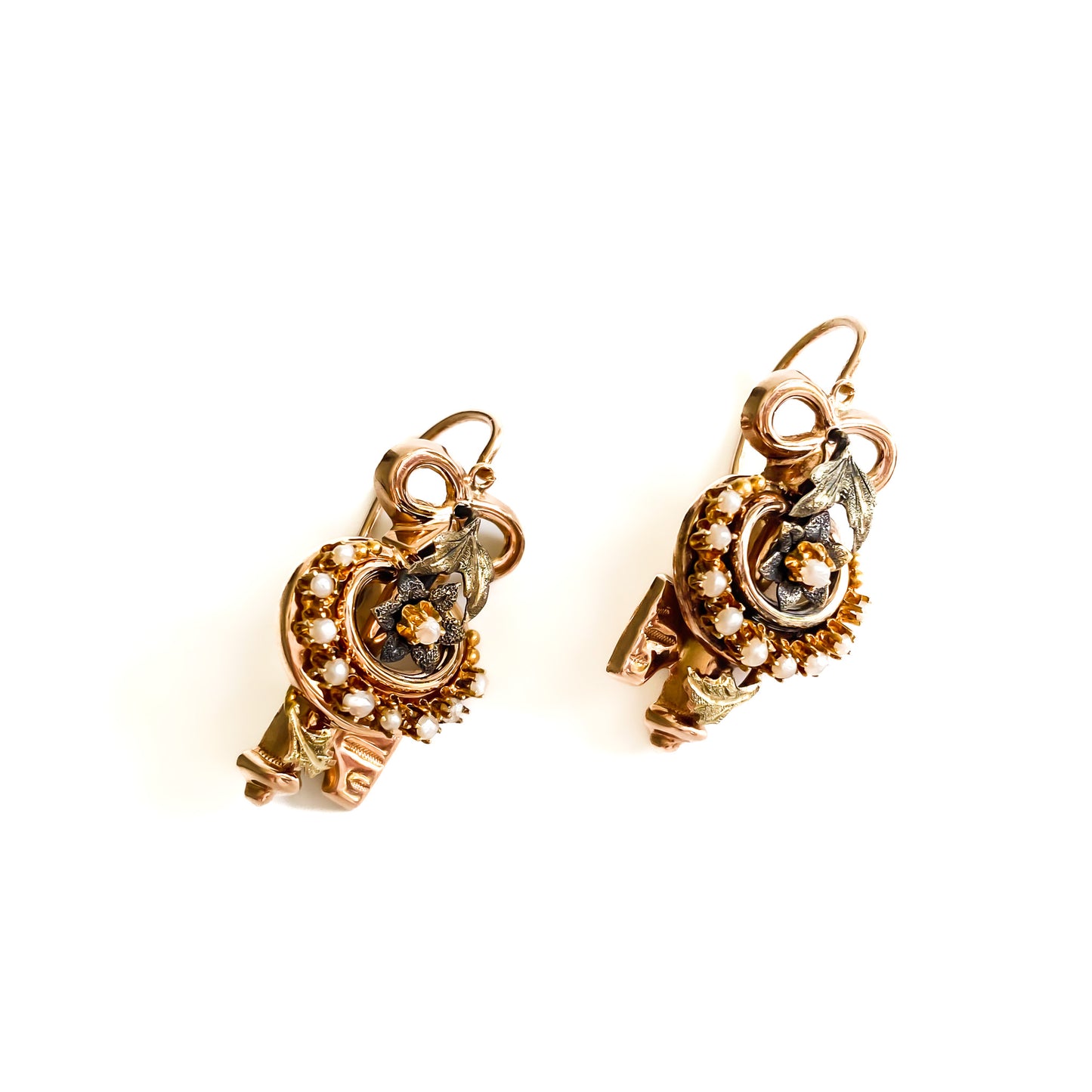 Exquisite Victorian rose and yellow gold earrings each set with ten tiny seed pearls. Front fastening shepherd hooks.