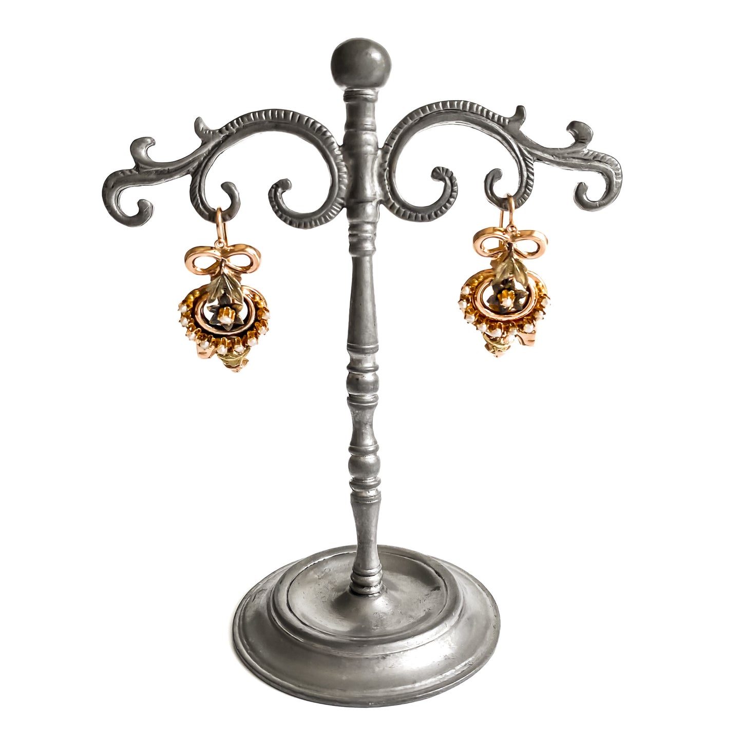 Exquisite Victorian rose and yellow gold earrings each set with ten tiny seed pearls. Front fastening shepherd hooks.