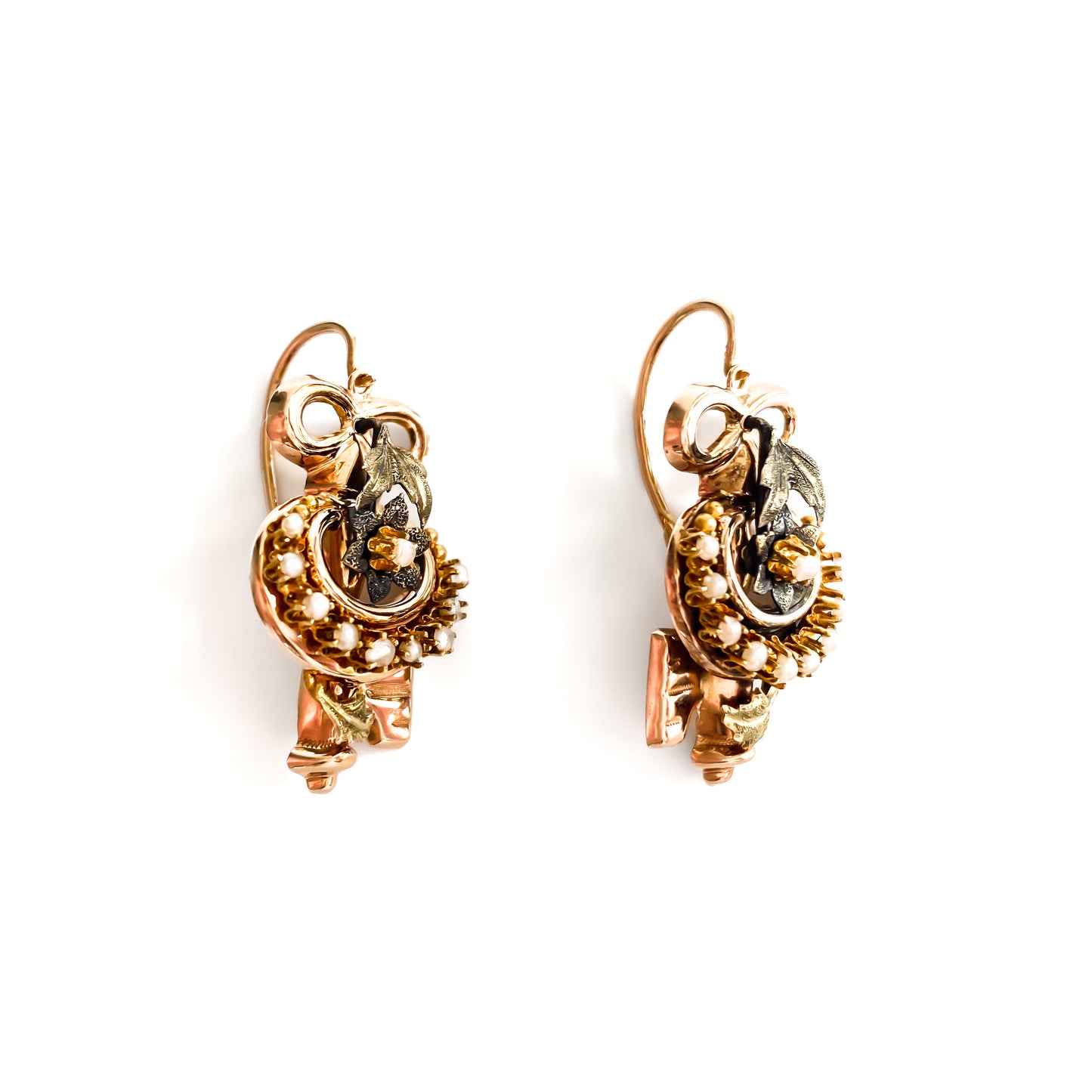 Exquisite Victorian rose and yellow gold earrings each set with ten tiny seed pearls. Front fastening shepherd hooks.